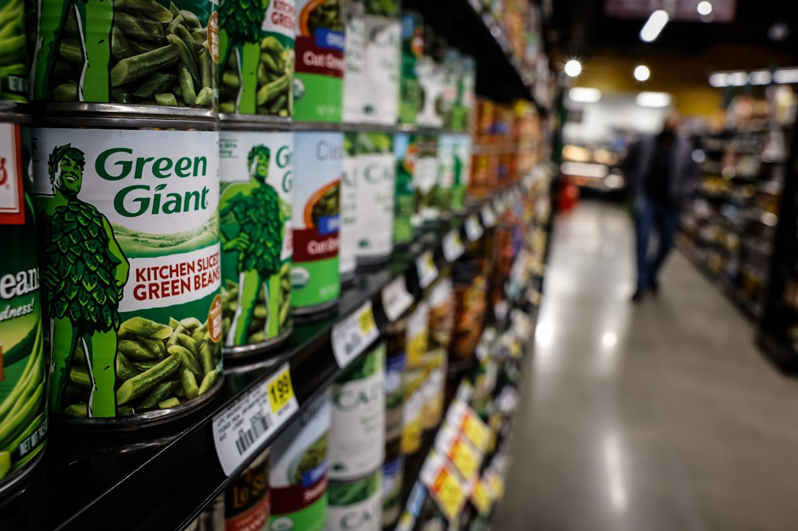 Food shelves at the Gem City Market on Salem Ave. are stocked Thursday February 9, 2023. JIM NOELKER/STAFF