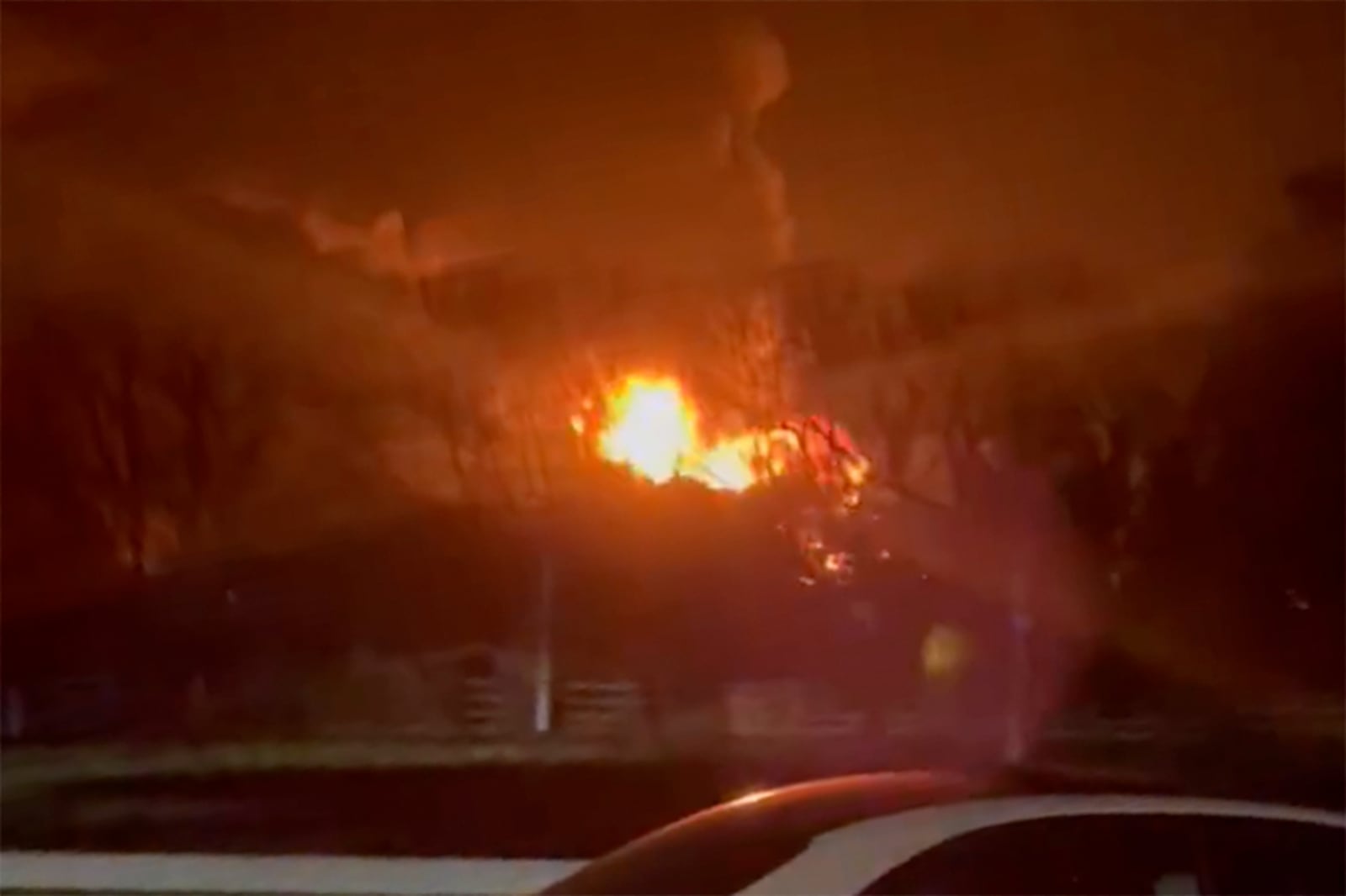 In this photo taken from video provided by Matthew Muirhead, a fire is seen at the North Hyde electrical substation near the Heathrow Airport in London, early Friday, March 21, 2025. (Matthew Muirhead via AP)