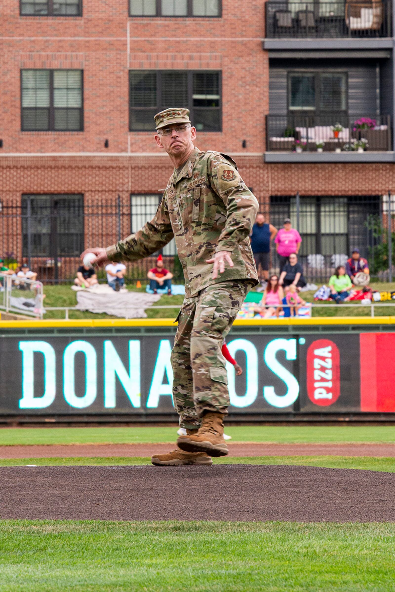 Gen. Duke Richardson, Air Force Materiel Command commander, throws out a ceremonial first pitch before the Dayton Dragons game Aug. 13 at Day Air Ballpark. U.S. AIR FORCE PHOTO/JAIMA FOGG