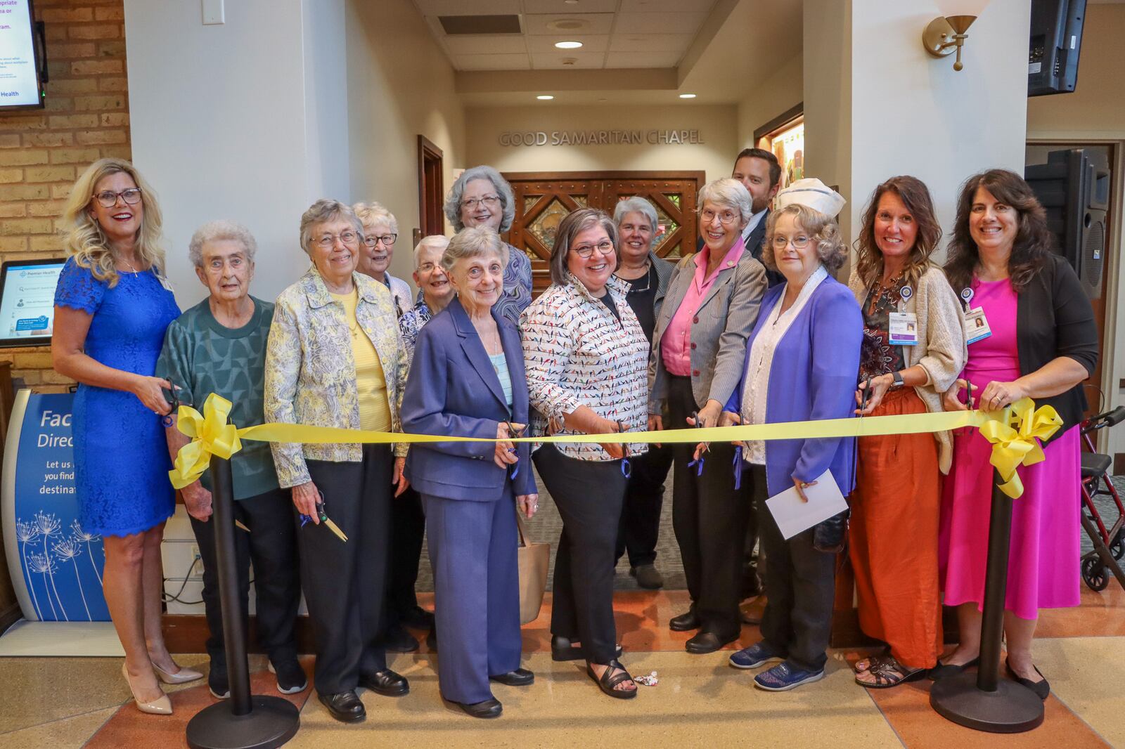 Miami Valley Hospital North recently opened its Good Samaritan Chapel, an interfaith chapel on its campus. The $1 million project was supported by fundraising efforts by the Good Samaritan Foundation-Dayton, members of which can be seen posing in front of the chapel after celebrating the opening of the chapel on Sept. 5, 2024. COURESTY OF PREMIER HEALTH