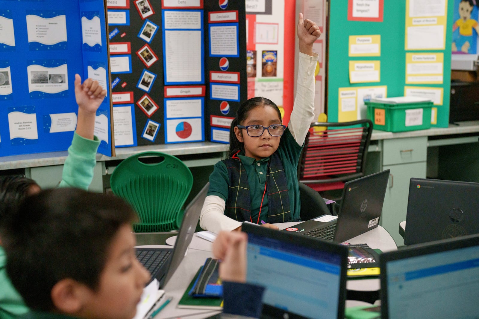 Students interact in a fourth grade classroom at William Jefferson Clinton Elementary in Compton, Calif., Thursday, Feb. 6, 2025. (AP Photo/Eric Thayer)