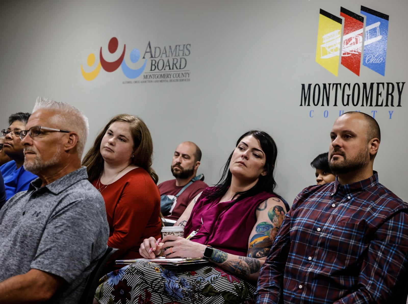 Montgomery County community members, stakeholders, metal health providers and others listen to Montgomery County Alcohol, Drug Addiction and Mental Health Services staff and board members discuss potential providers to fill in for RI International, which ceased its partnership with ADAMHS and will no longer be providing crisis services for the county. The new proposed providers were voted down at a later ADAMHS board meeting on Wednesday, May 22. JIM NOELKER/STAFF