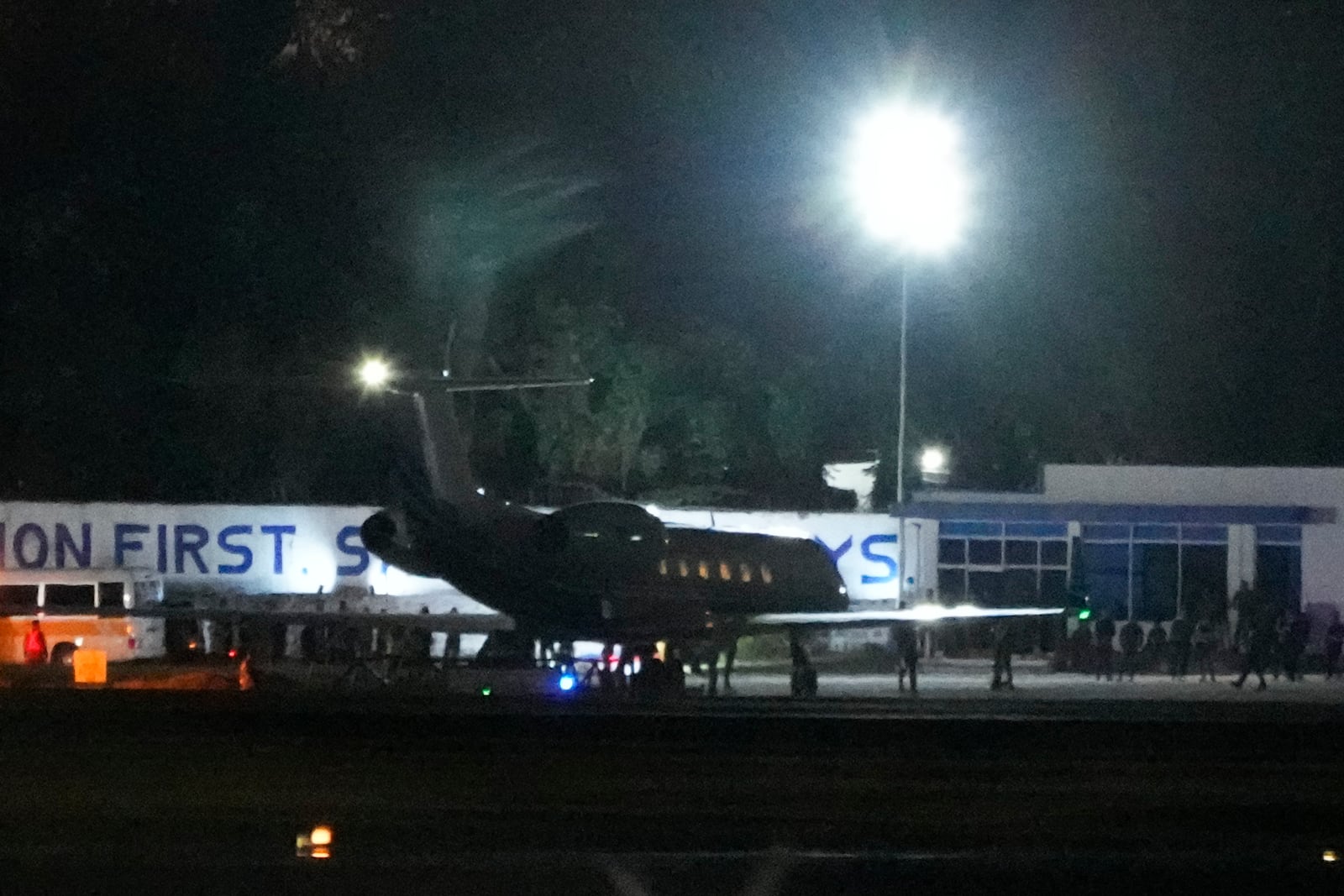 A plane carrying former President Rodrigo Duterte prepares to leave at the Villamor Air Base in Manila, Philippines, Tuesday, March 11, 2025. (AP Photo/Aaron Favila)