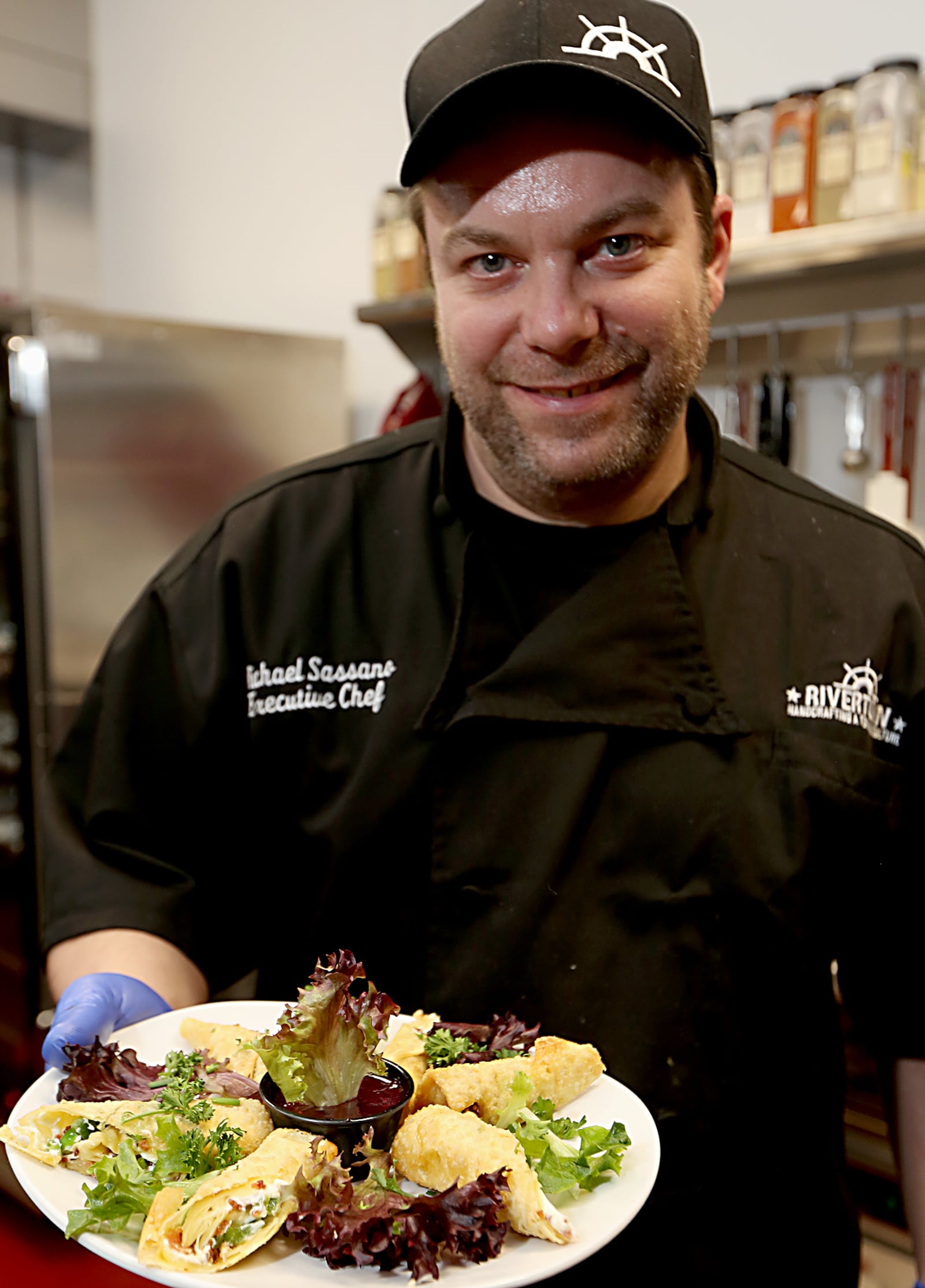 Executive chef Michael Sassano with Bacon and Jalapeno Wonton Rolls at Rivertown Brewing Company in Monroe.