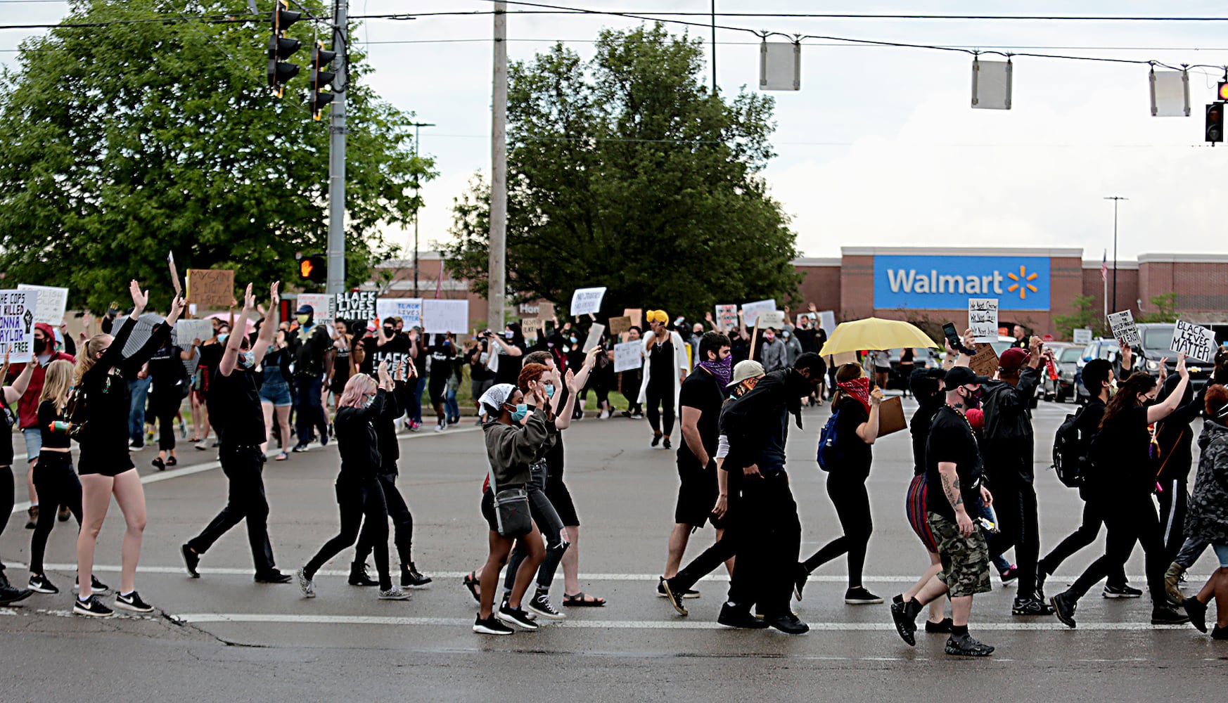 PHOTOS: Demonstrators rally for justice in Beavercreek