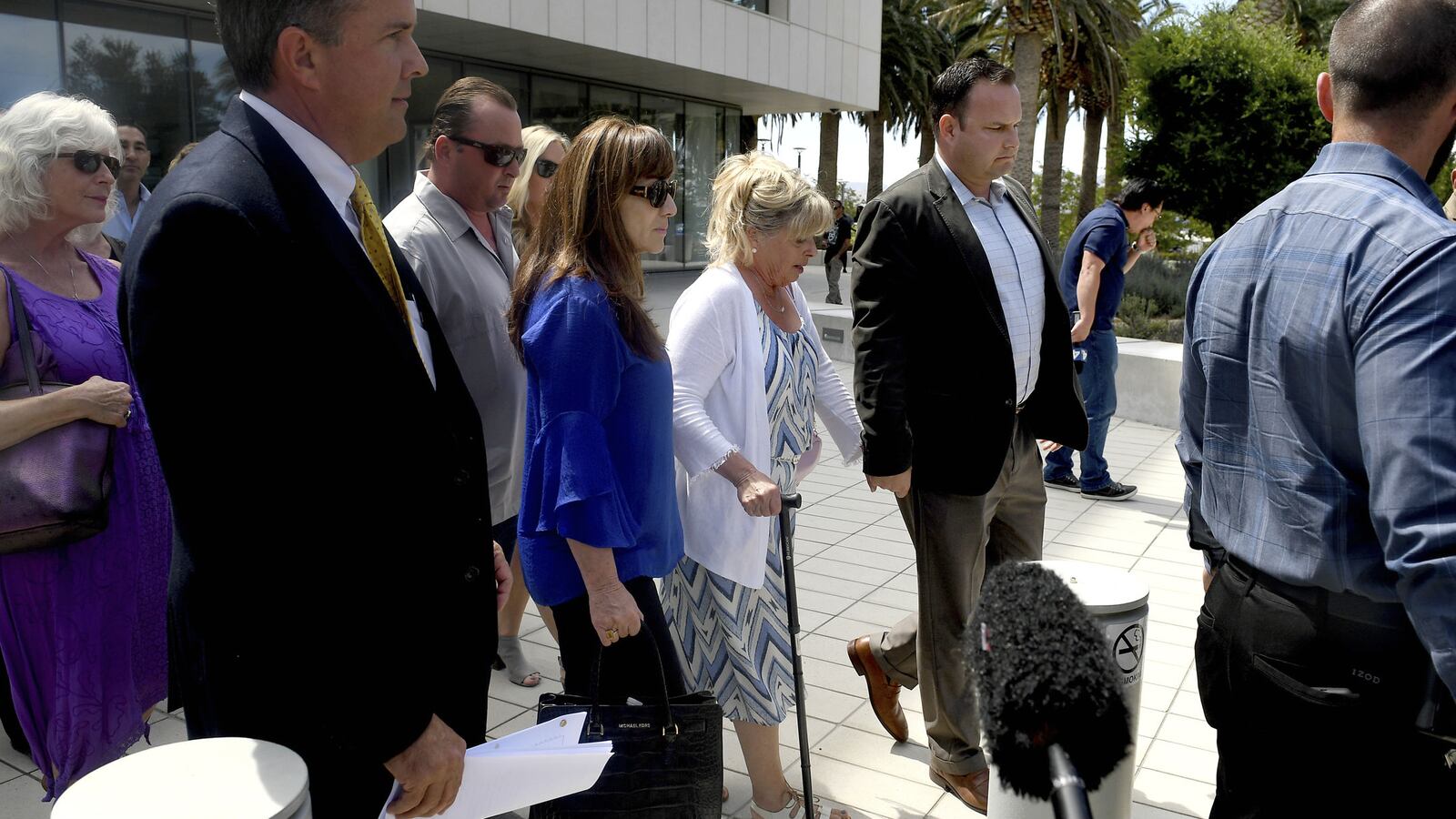 Joseph McStay's mother, Susan Blake, center with cane, and other McStay family members leave the San Bernardino courthouse Monday, June 10, 2019, after Charles Ray "Chase" Merritt was convicted of four counts of first-degree murder in the 2010 deaths of Joseph McStay, 40, Summer McStay, 43, and their two sons, Gianni McStay, 4, and Joseph McStay Jr., 3. The family's remains were found buried in 2013 in the Mojave Desert about 100 miles from home.