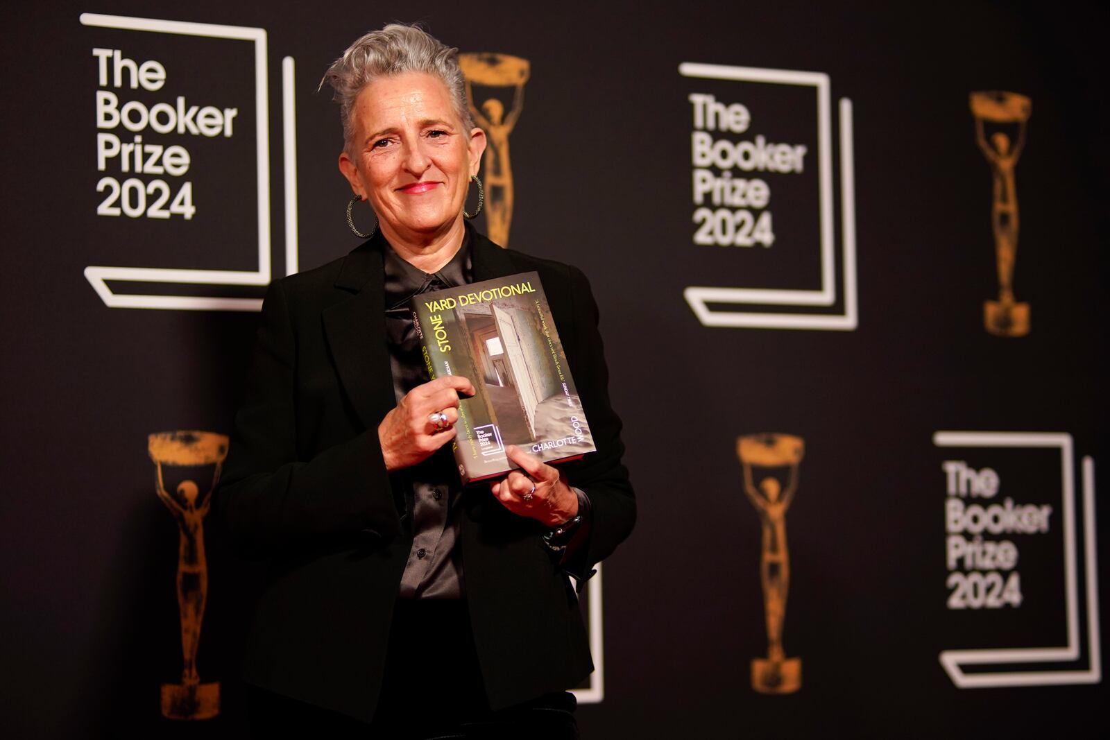 Charlotte Wood arrives at the Booker Prize award dinner in London, Tuesday, Nov. 12, 2024. (AP Photo/Alberto Pezzali)