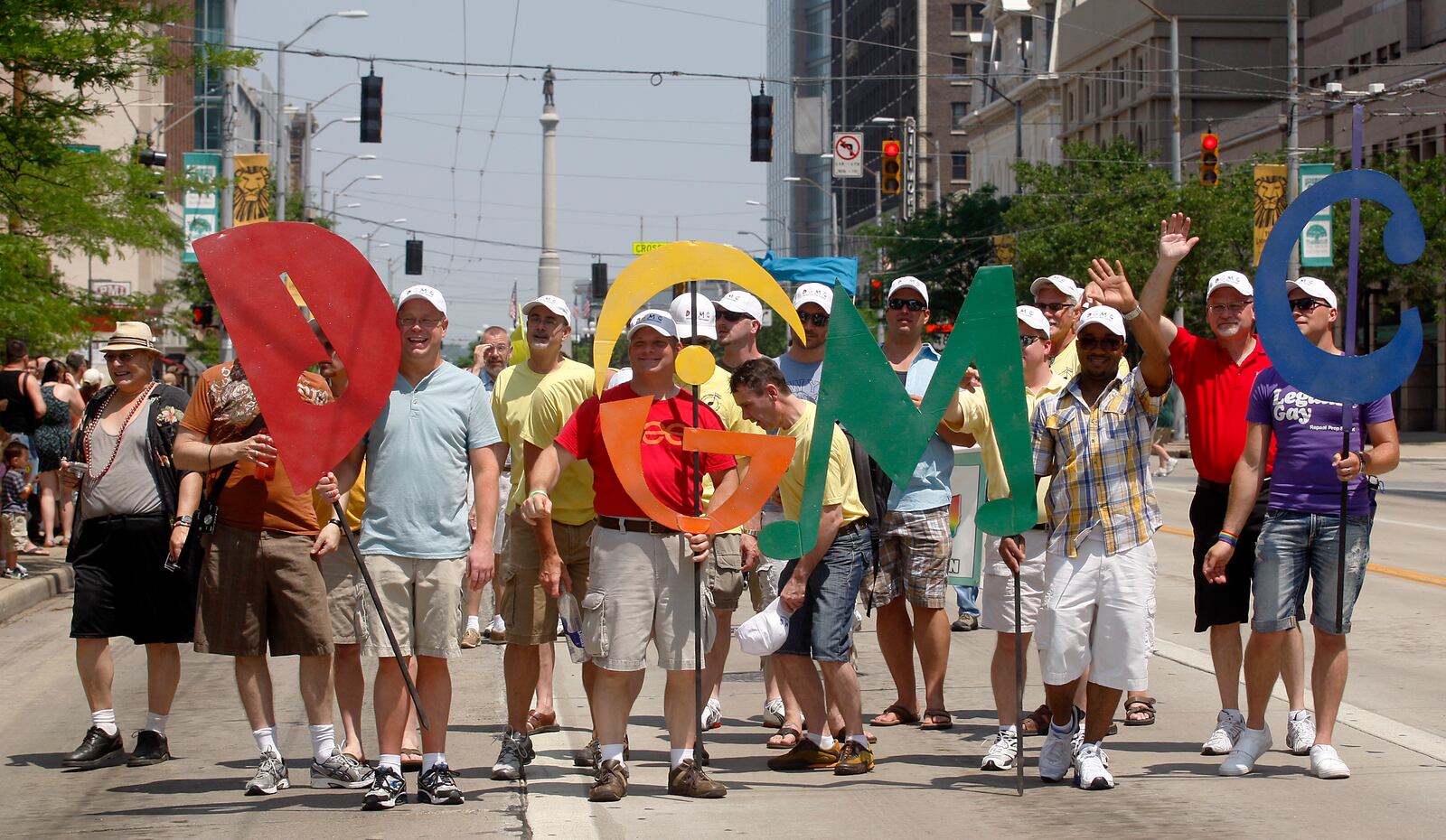 Members of the Dayton Gay Men's Choir make their way up Main Street in the 10th annual Miami Valley Pride Parade Saturday, June 4 2011.