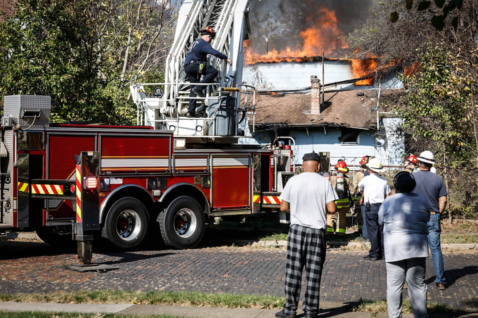 Dayton crews were called to the report of a fire at an abandoned house near the corner of North Conover and Dakota streets on Wednesday, Oct. 30, 2024. JIM NOELKER/STAFF