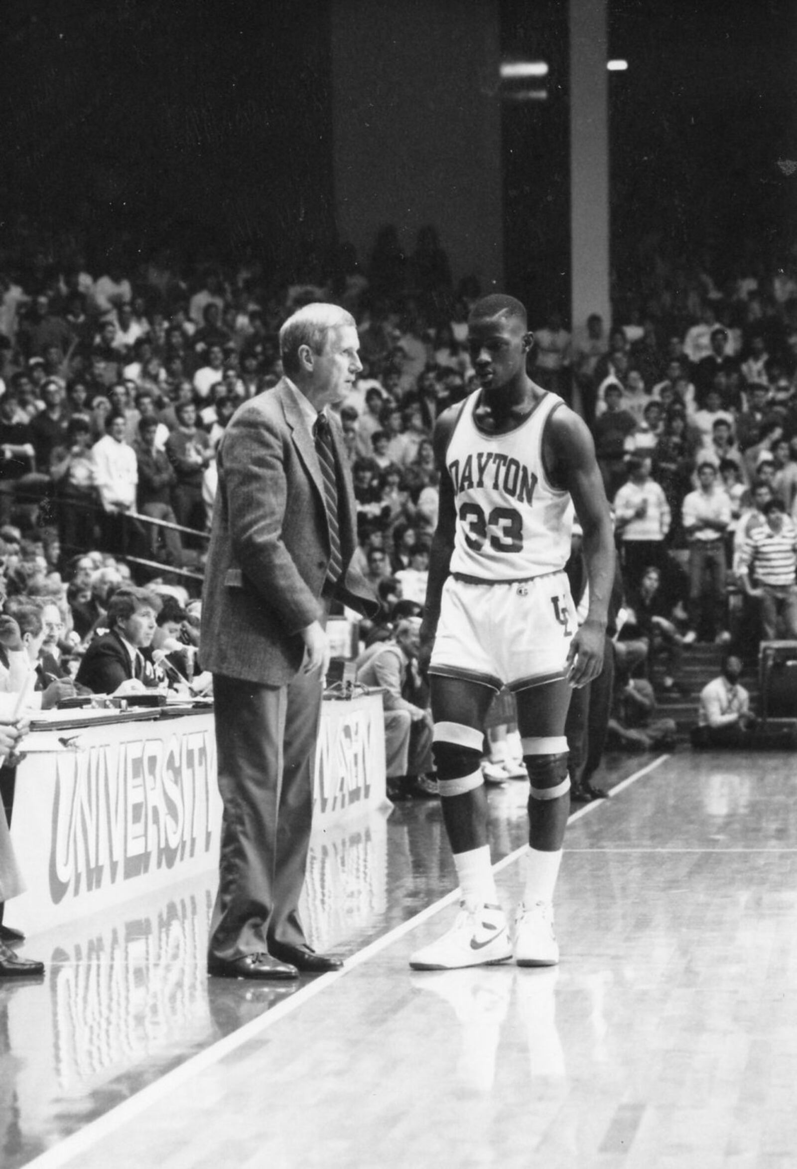 Legendary former Dayton coach Don Donoher with then Flyers player and current UD coach Anthony Grant. Photo courtesy of UD Athletics