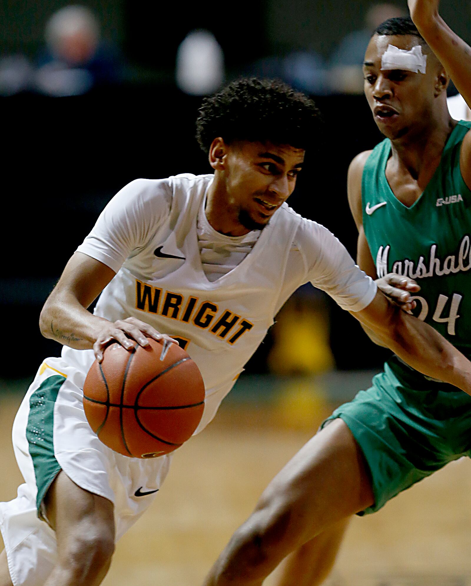 Wright State guard Trey Calvin is covered by Marshall guard Taevion Kinsey during a mens basketball game at the Nutter Center in Fairborn Thursday, Dec. 3, 2020. (E.L. Hubbard for the Dayton Daily News)