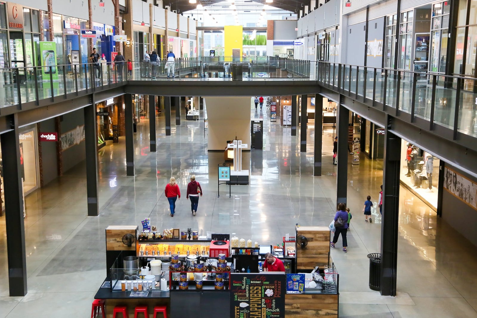 Shoppers walk through the Foundry at Liberty Center, Thursday, Oct. 20, 2016. Liberty Center is celebrating their one year anniversary this weekend. GREG LYNCH / STAFF