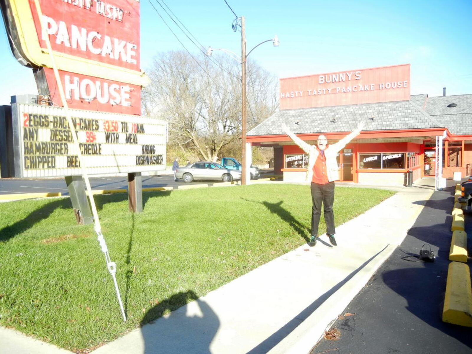 California-based performance artist Charles Phoenix searched for the Miami Valley's classic and kitschy local landmarks and lore ahead of his Holiday Slide Show at Dayton Art Institute Thursday, Dec 6. Phoenix outside of the Hasty Tasty Pancake House at 3509 Linden Avenue in Dayton. Photo by Amelia Robinson