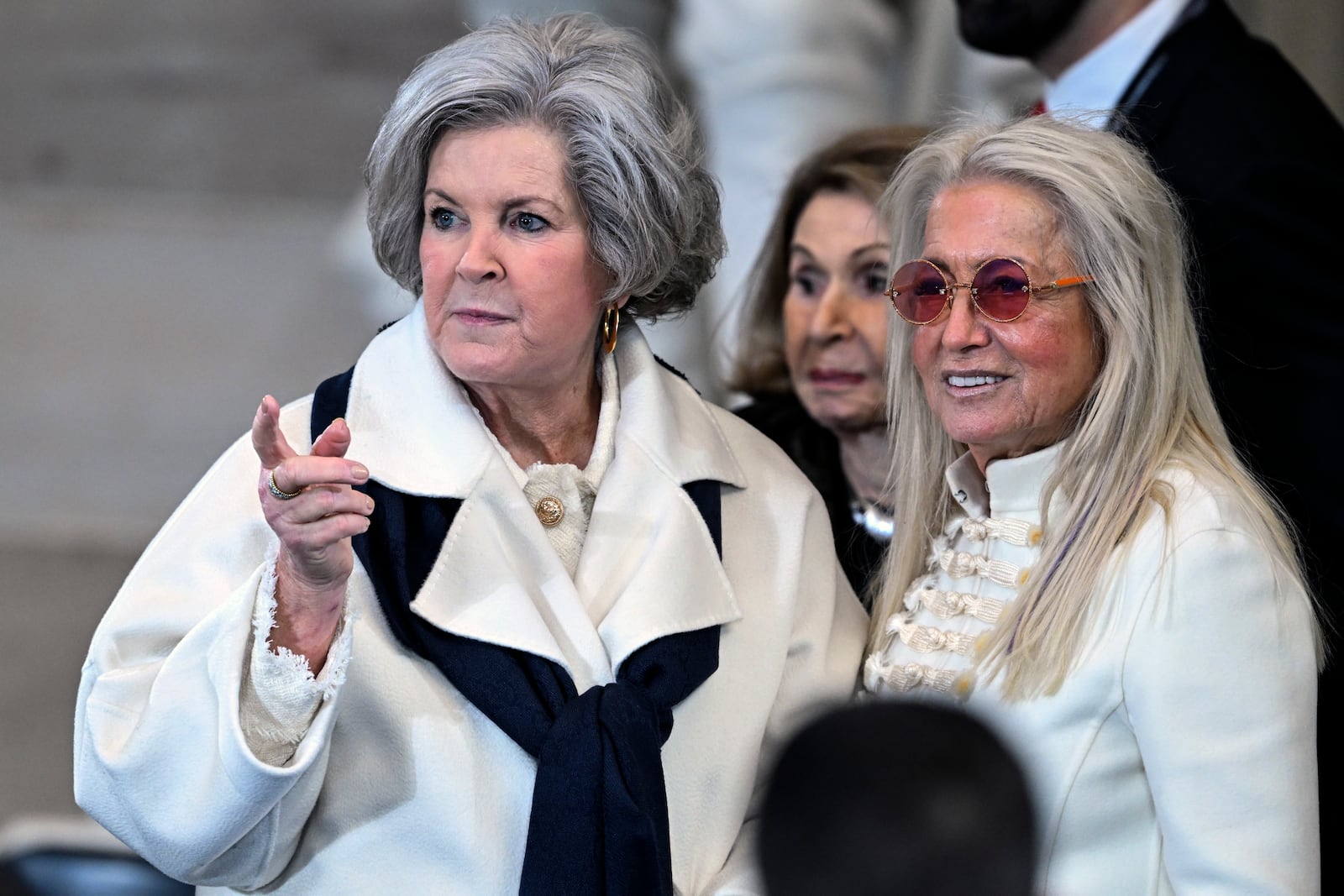 Incoming White House Chief of Staff Susie Wiles, left, speaks with Miriam Adelson as they arrive before the 60th Presidential Inauguration in the Rotunda of the U.S. Capitol in Washington, Monday, Jan. 20, 2025.(Saul Loeb/Pool photo via AP)