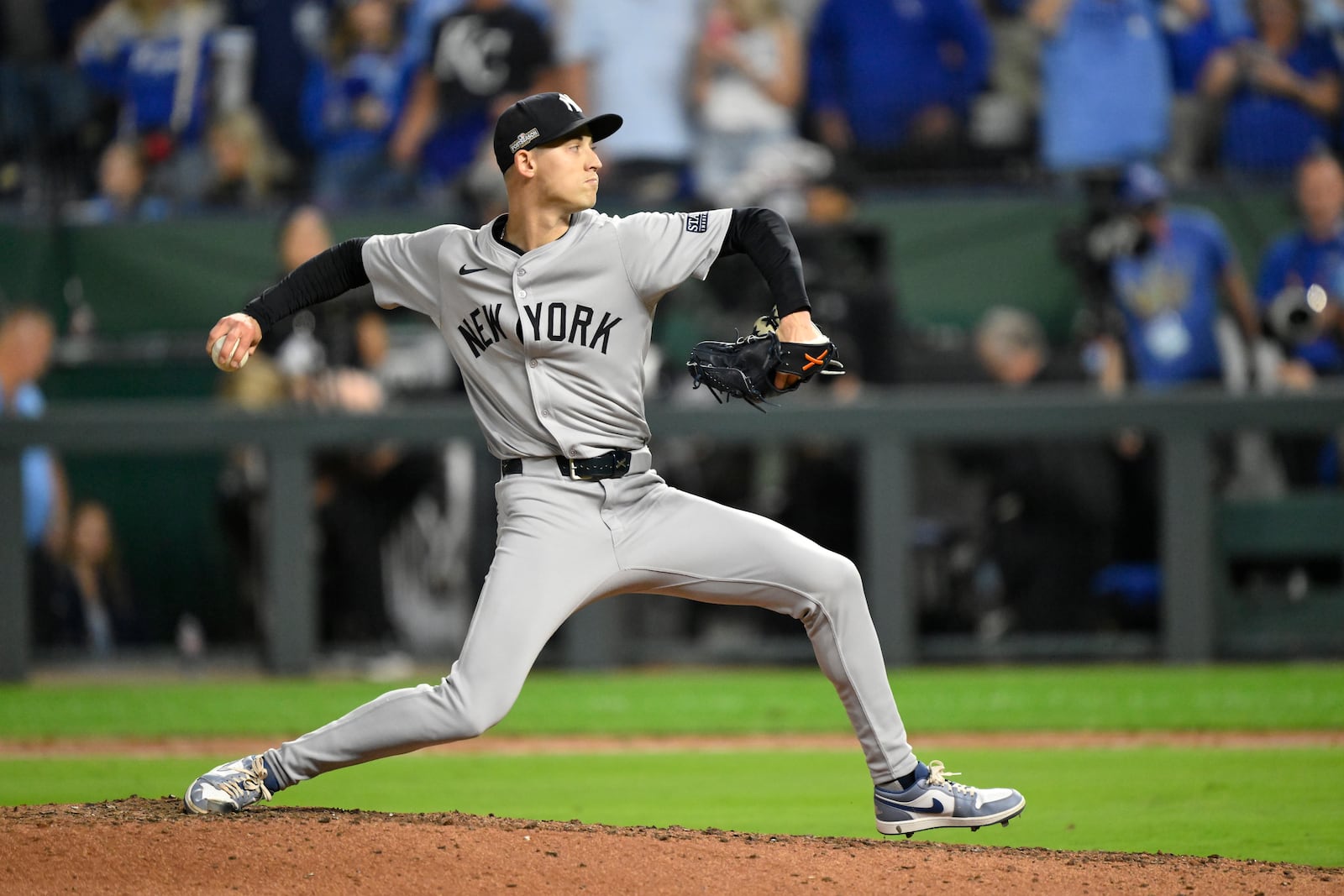 New York Yankees relief pitcher Luke Weaver throws during the ninth inning in Game 4 of an American League Division baseball playoff series against the Kansas City Royals Thursday, Oct. 10, 2024, in Kansas City, Mo. (AP Photo/Reed Hoffmann)