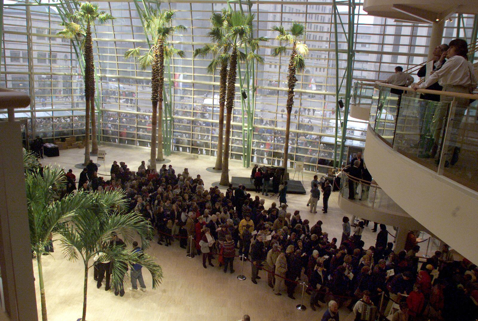 03/01/03  A massive line of people, waiting to get in, wraps around and into the front entrance of the Schuster Performing Arts Center for the public grand opening on Sunday afternoon.