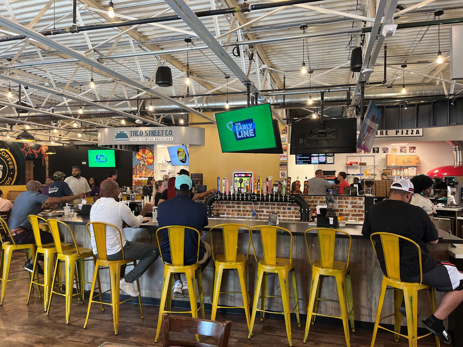 West Social Tap & Table food hall in the Wright Dunbar business district. CORNELIUS FROLIK / STAFF