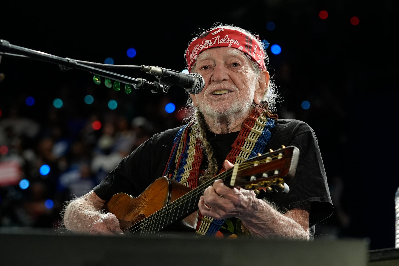 Musician Willie Nelson performing ahead of event for Democratic presidential nominee Vice President Kamala Harris at a rally in Houston, Friday, Oct. 25, 2024. (AP Photo/Susan Walsh)