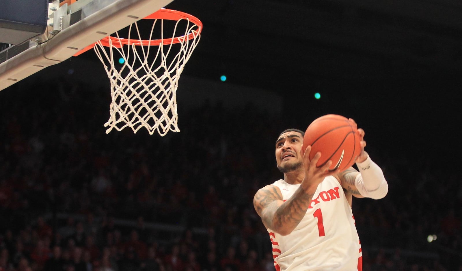 Dayton’s Obi Toppin dunks against Davidson on Friday, Feb. 28, 2020, at UD Arena. David Jablonski/Staff