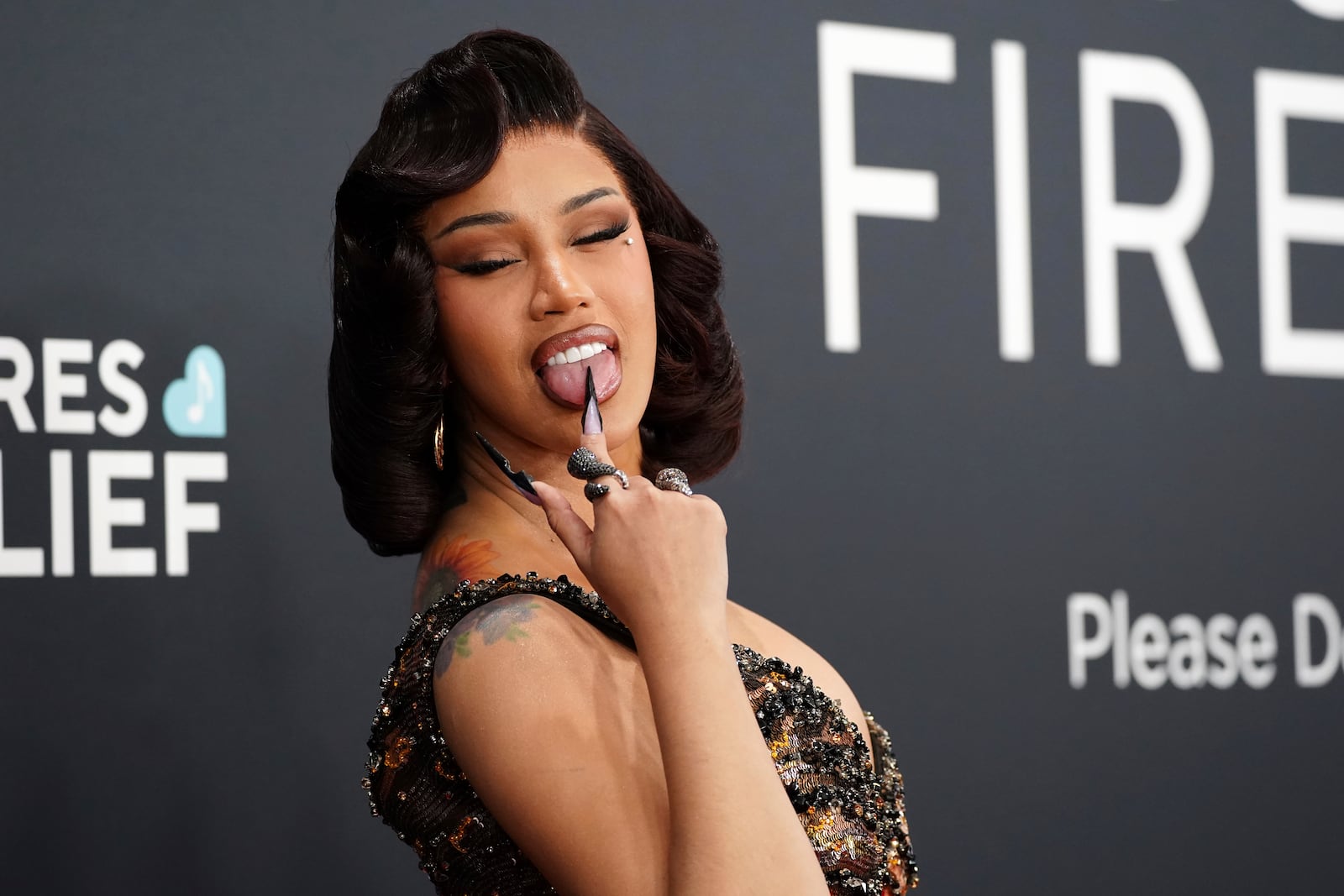 Cardi B arrives at the 67th annual Grammy Awards on Sunday, Feb. 2, 2025, in Los Angeles. (Photo by Jordan Strauss/Invision/AP)