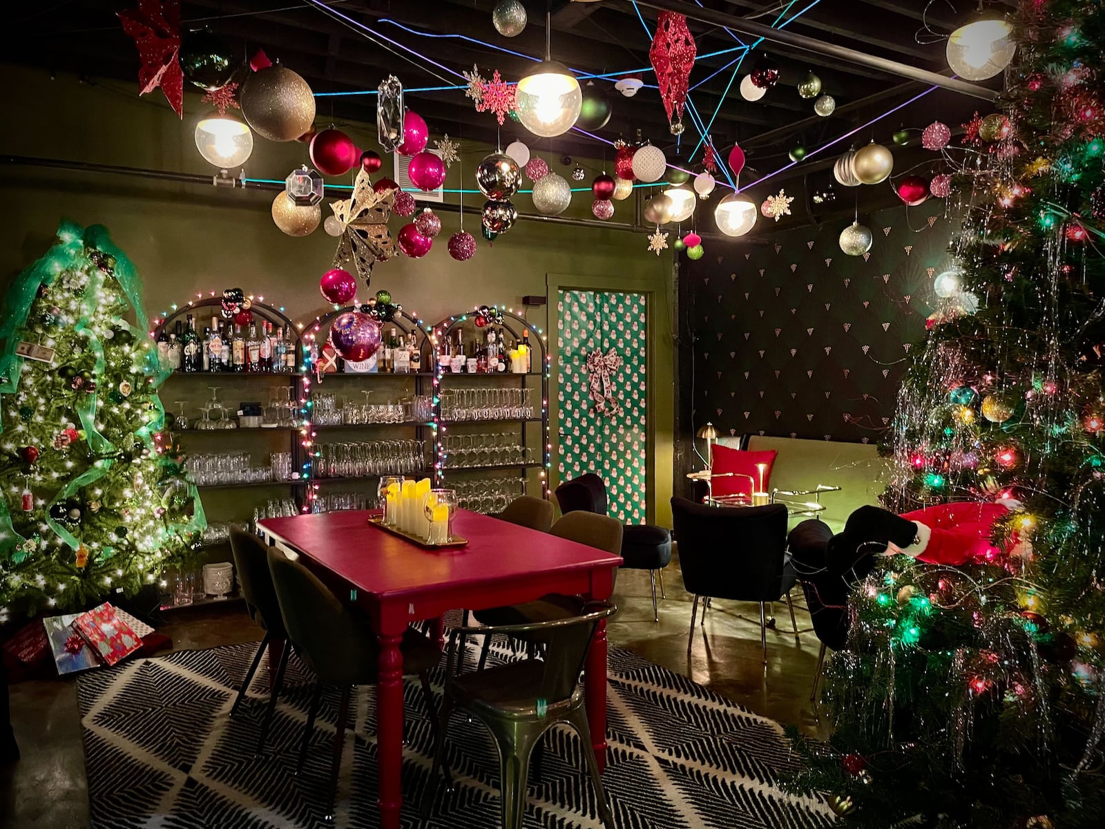 The cocktail lounge in the basement of Cherry Street Bottle Shop in Troy will be transformed into a Christmas pop-up bar this holiday season. “Cheer on Cherry Street” will be open Thursdays, Fridays and Saturdays from Nov. 29 through Dec. 28. NATALIE JONES/STAFF