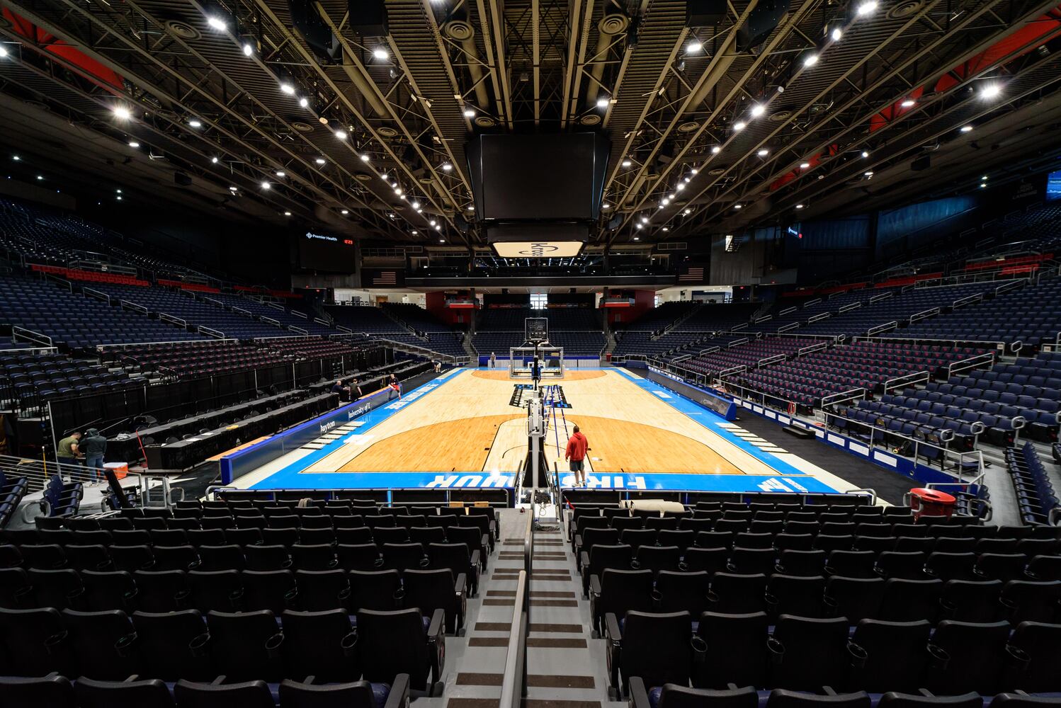 PHOTOS: NCAA First Four basketball court installation at UD Arena