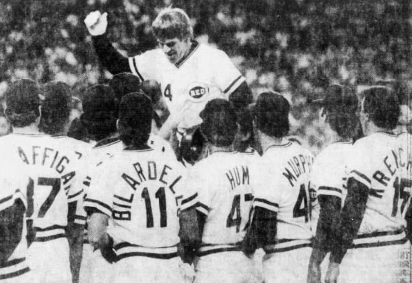 Pete Rose celebrates with teammates after his record-breaking 4,192nd hit on Sept. 11, 1985, at Riverfront Stadium in Cincinnati. Dayton Daily News photo by Charles Steinbrunner