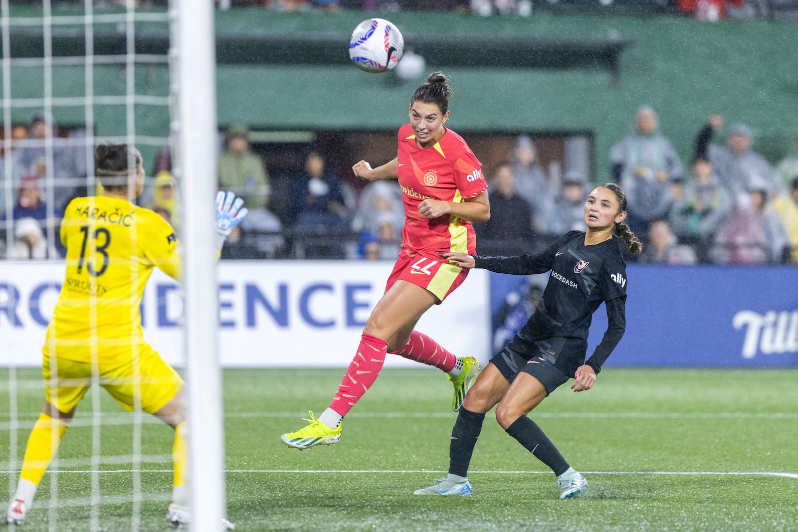 Portland Thorns midfielder Morgan Weaver (22) scores a goal on a header in extra time during the first half of an NWSL soccer match against Angel City FC at Providence Park on Friday Nov. 1, 2024 in Portland, Ore. (Sean Meagher/The Oregonian via AP)