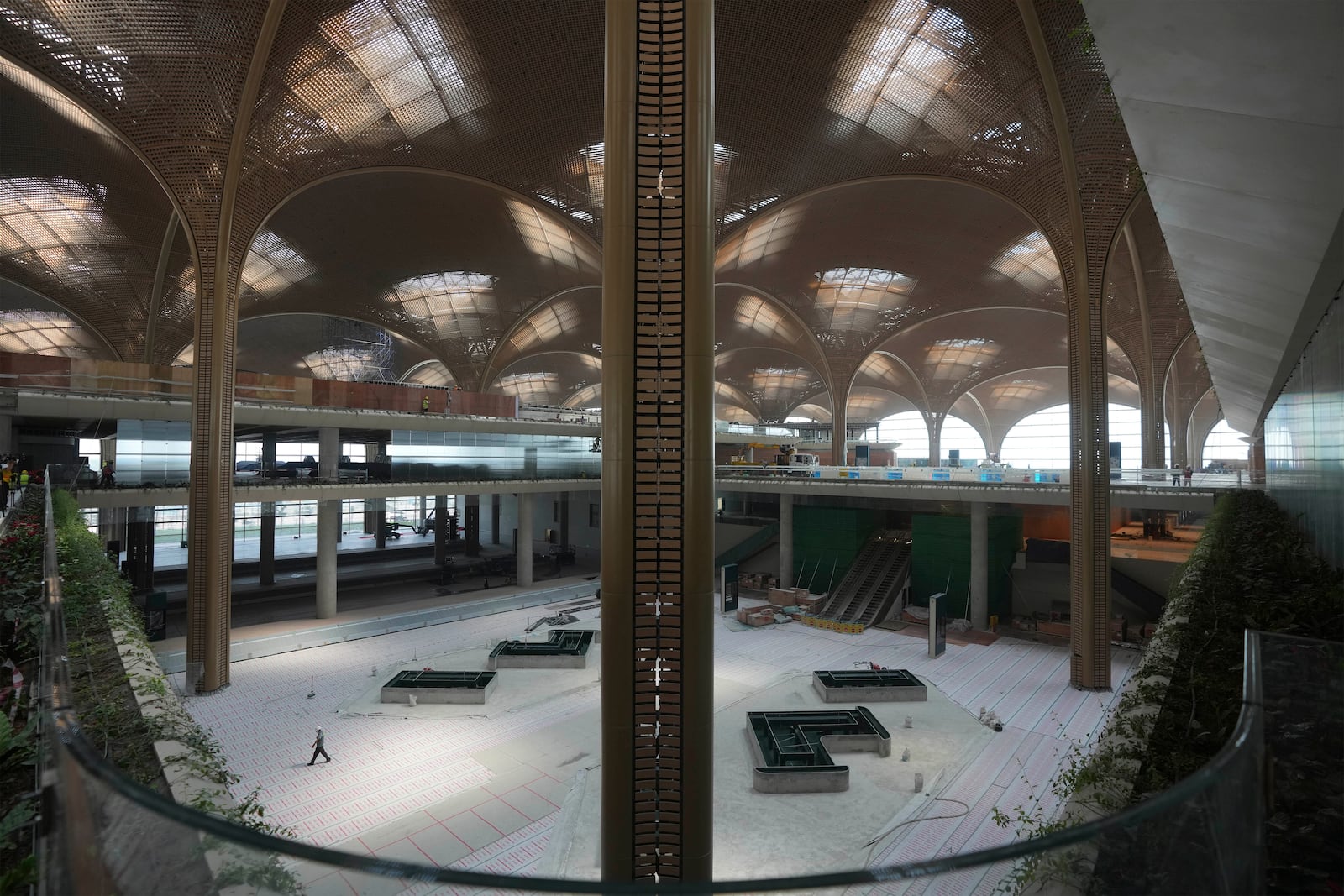 A view inside an under construction of a new airport of Techo International Airport at the outskirts of Phnom Penh Cambodia, Friday, March 21, 2025. (AP Photo/Heng Sinith)