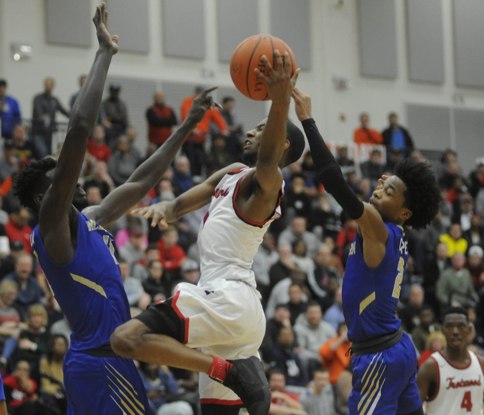 Trotwood’s Amari Davis (with ball). McEachern (Ga.) defeated Trotwood-Madison 87-77 in the 16th Annual Premier Health Flyin’ to the Hoop at Trent Arena in Kettering on Sat., Jan. 13, 2018. MARC PENDLETON / STAFF