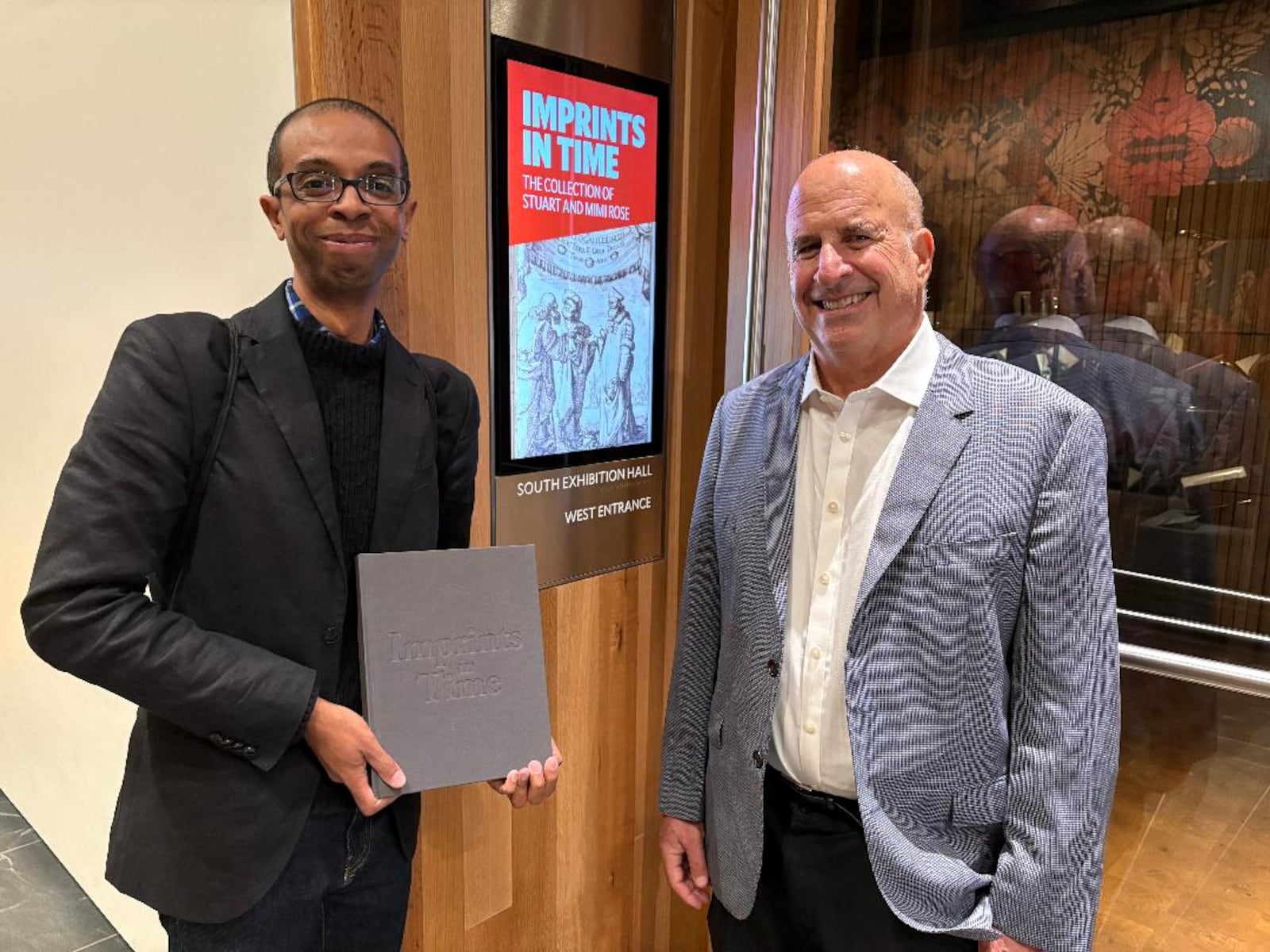 Lifestyles reporter Russell Florence Jr. with Stuart Rose at the Folger Shakespeare Library in Washington, D.C. The Folger is exhibiting the rare book collection of Dayton-based collectors Stuart and Mimi Rose in “Imprints in Time,” the inaugural show in the library’s new special exhibitions gallery. PHOTO BY GREG PRICKMAN