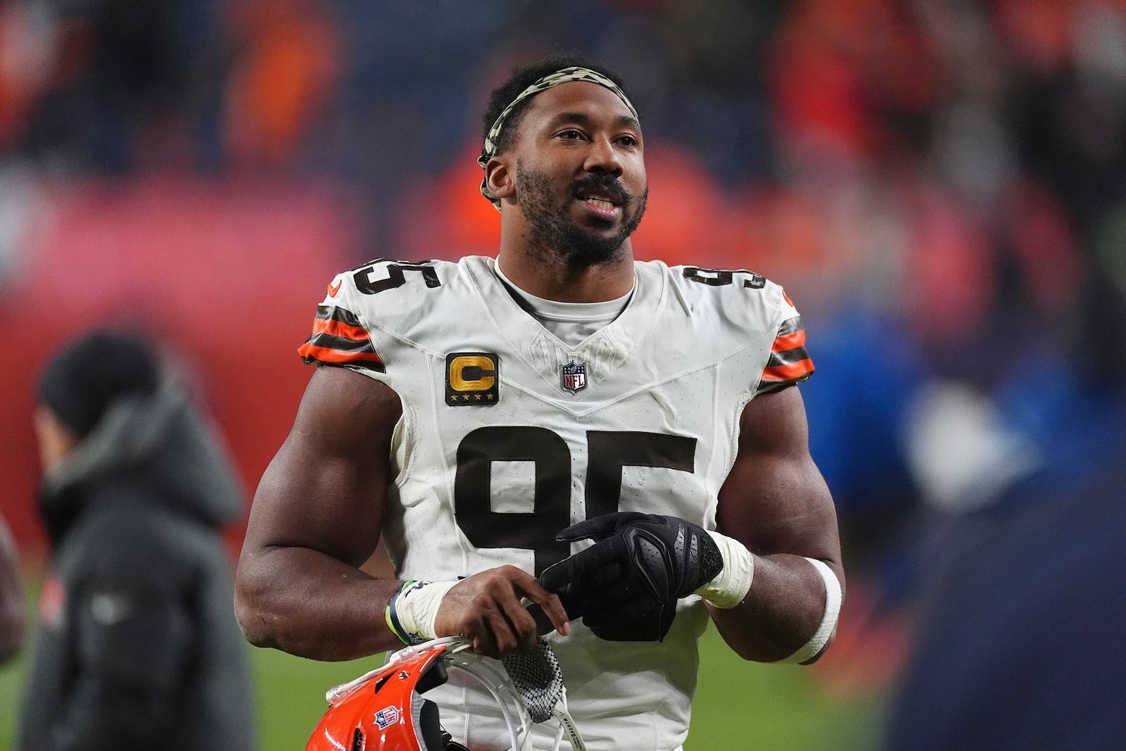 Cleveland Browns defensive end Myles Garrett heads off the field after an NFL football game against the Denver Broncos Monday, Dec. 2, 2024, in Denver. (AP Photo/David Zalubowski)