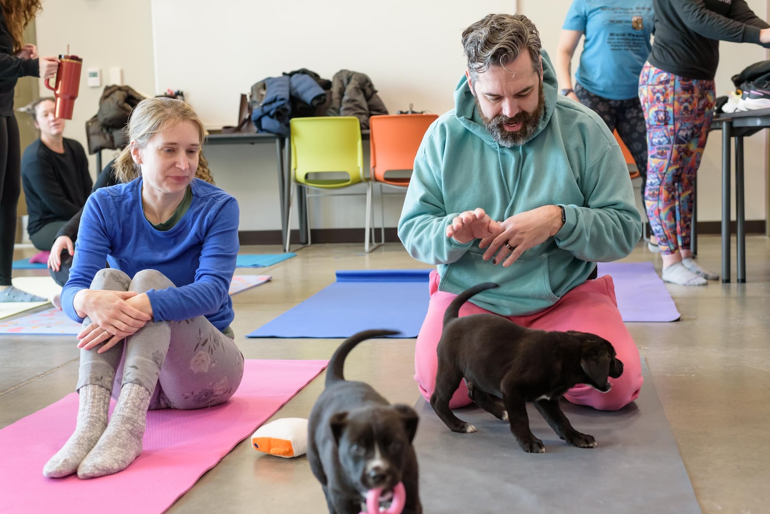 PHOTOS: Puppy Yoga at SICSA Pet Adoption and Wellness Center