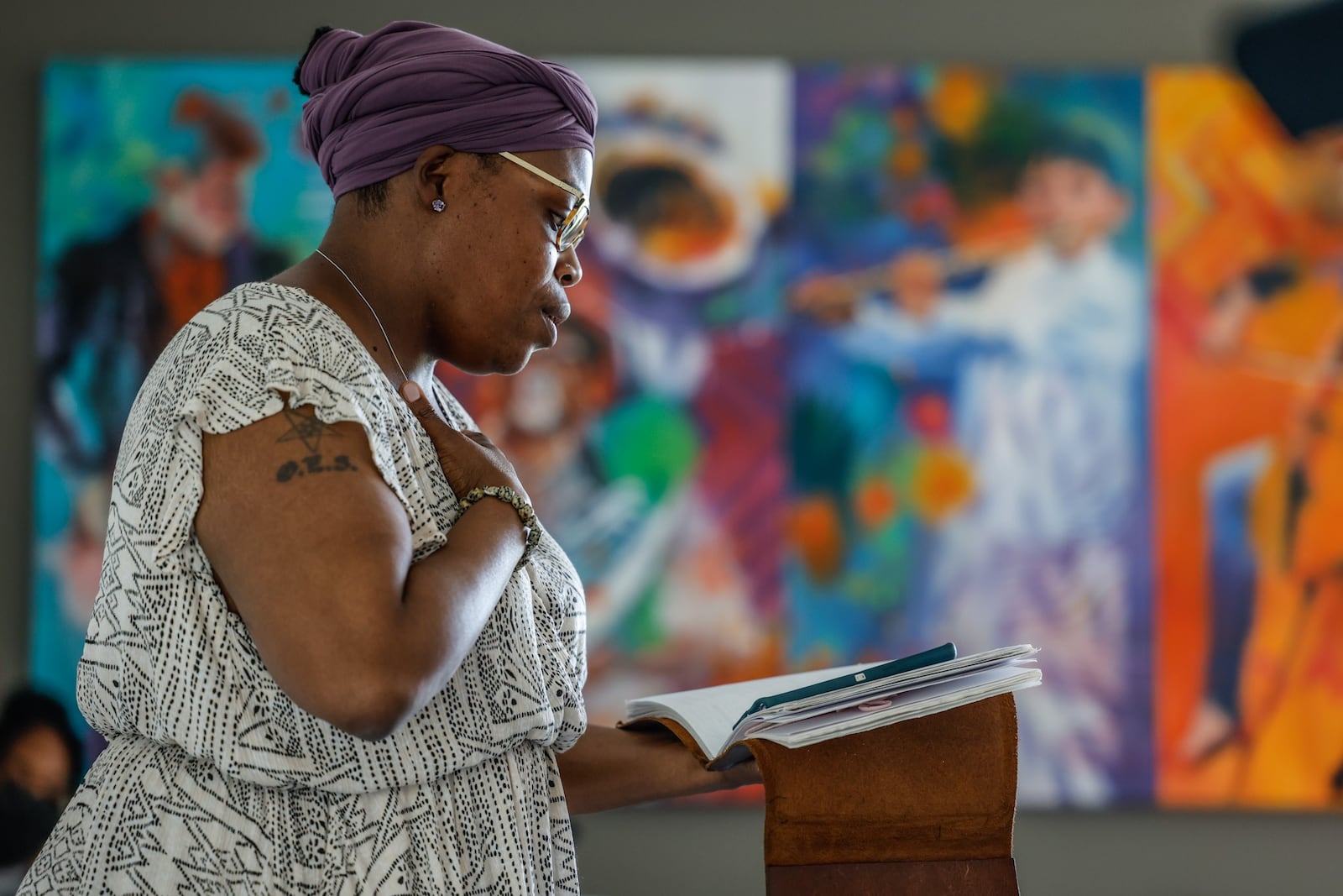 Dayton poet, Sierra Leone reads an original poem at the Juneteenth celebration at the Trotwood library Thursday June 16, 2022. JIM NOELKER/STAFF