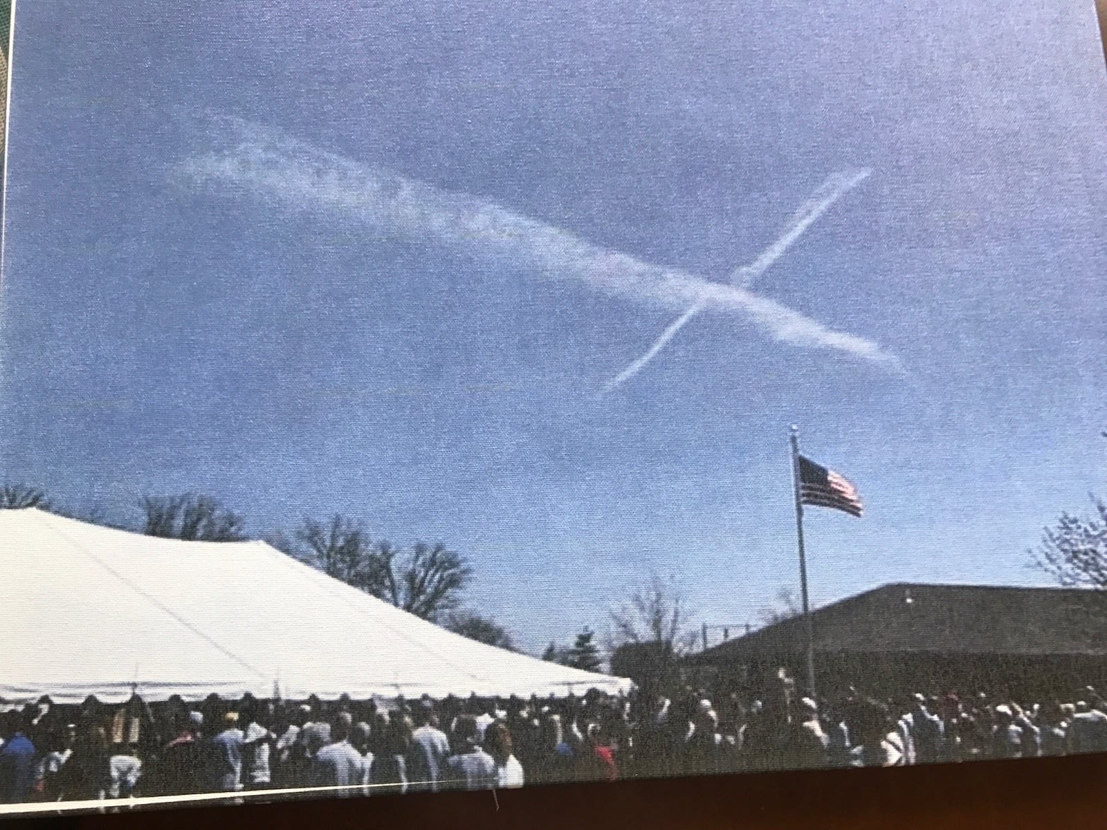 Organizers thought maybe 500 people would show up for a 5K run in Maria Stein for Dan Thobe, but 2700 participated. Above the crowd a cross formed in the sky. Dan Thobe, who is fighting brain cancer, said he hopes it’s a good sign. CONTRIBUTED