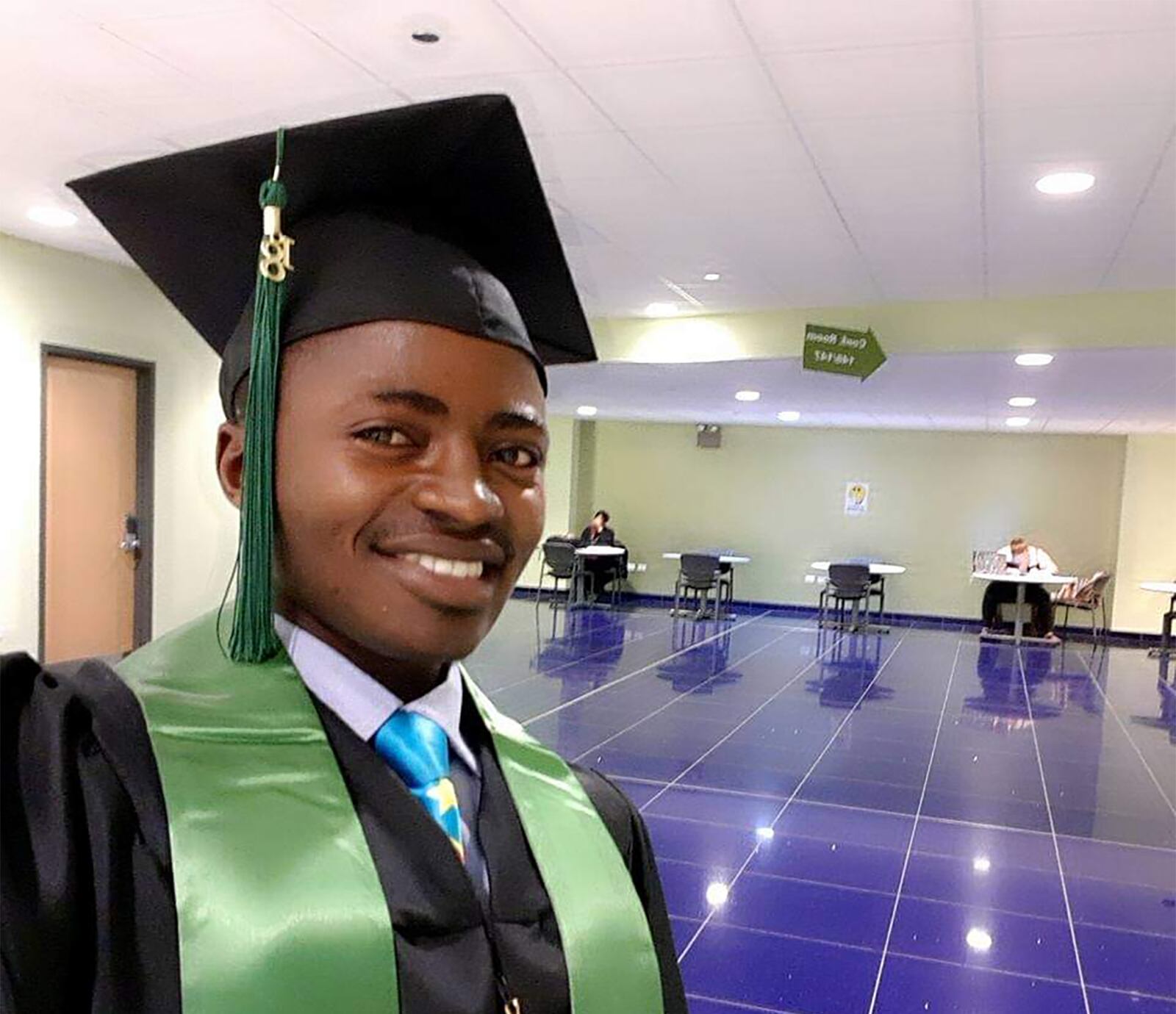 Neayambeje Kalinda at his graduation from the City College of Chicago in 2018. He received his associate degree in political science. CONTRIBUTED