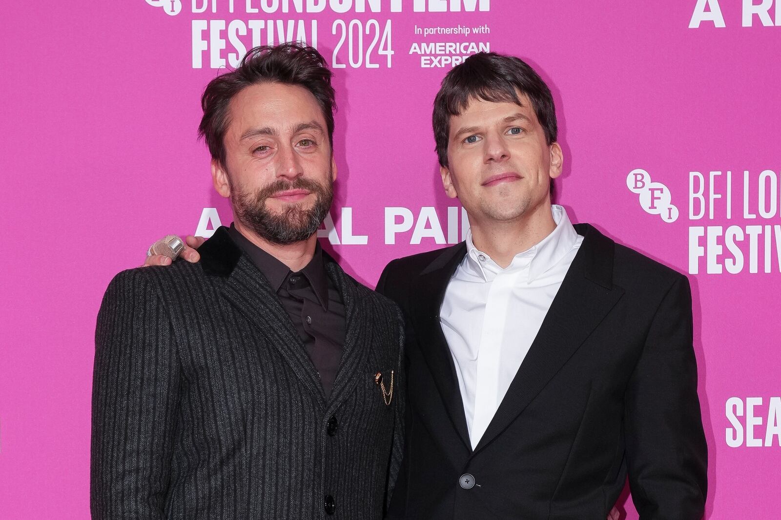 Kieran Culkin, left, and director Jesse Eisenberg pose for photographers upon arrival at the premiere of the film 'A Real Pain' during the London Film Festival on Sunday, Oct. 13, 2024, in London. (Photo by Scott A Garfitt/Invision/AP)