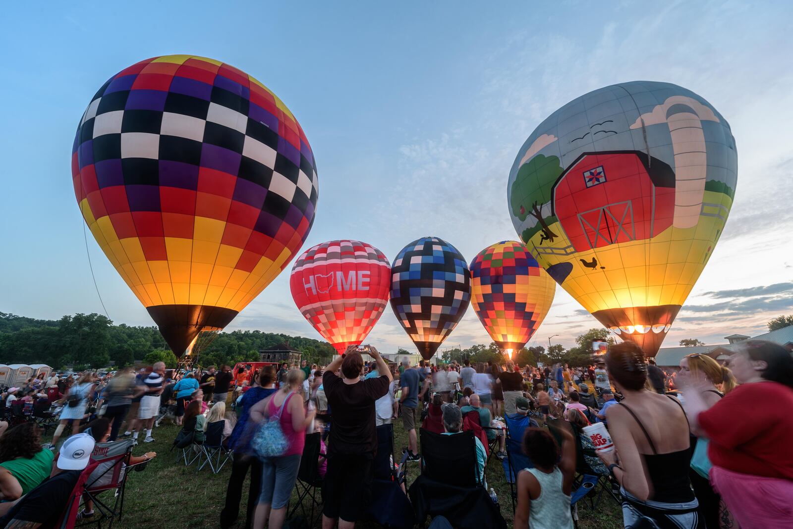 The City of West Carrollton hosted a hot air balloon glow by the Askren Air Balloon Team with food trucks, beer and a concert featuring The Fries Band on Friday, July 12, 2024 at 1 S. Elm St. TOM GILLIAM / CONTRIBUTING PHOTOGRAPHER