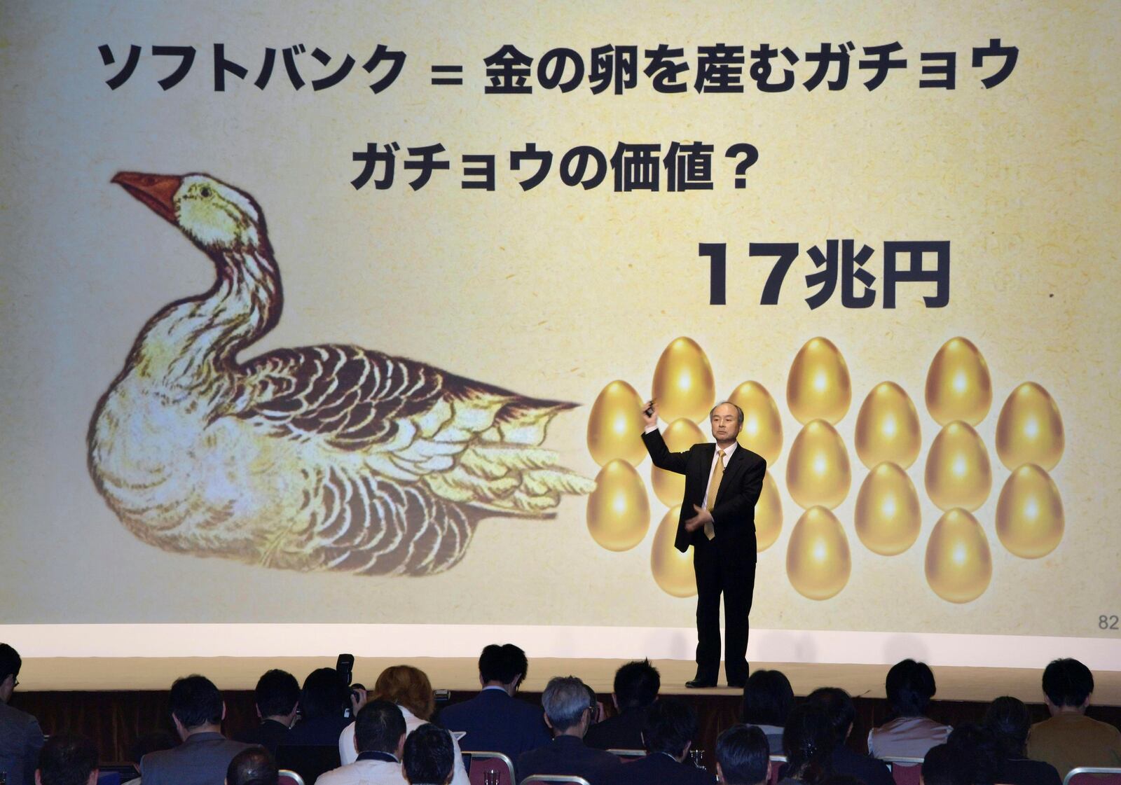 SoftBank Group Corp. Chief Executive Officer Masayoshi Son attends an investor presentation at a Tokyo hotel on May 10, 2017. The letters read: "Softbank = A goose laying the golden eggs." (Kyodo News via AP)