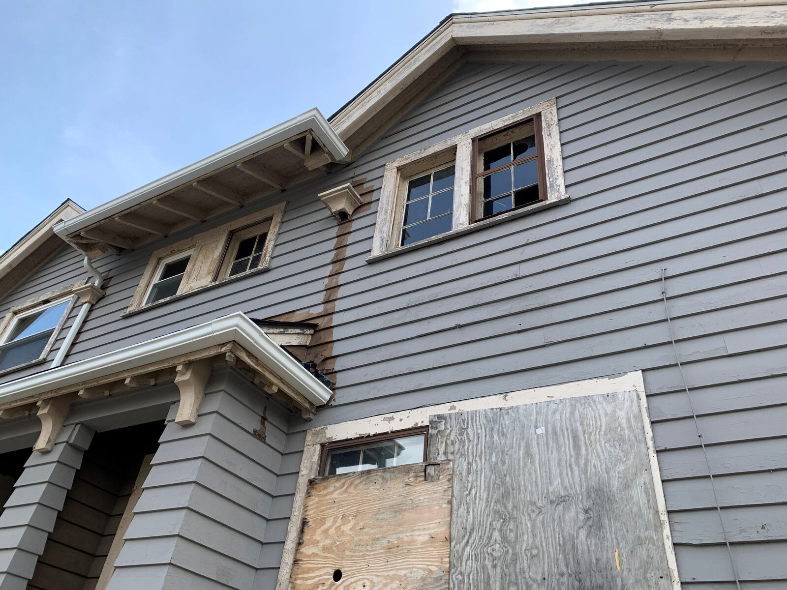 The owners of this duplex on Neal Avenue in Dayton received $10,350 in rental assistance last year through a Montgomery County program funded with federal CARES Act funds. The house is empty and had no water service last year.