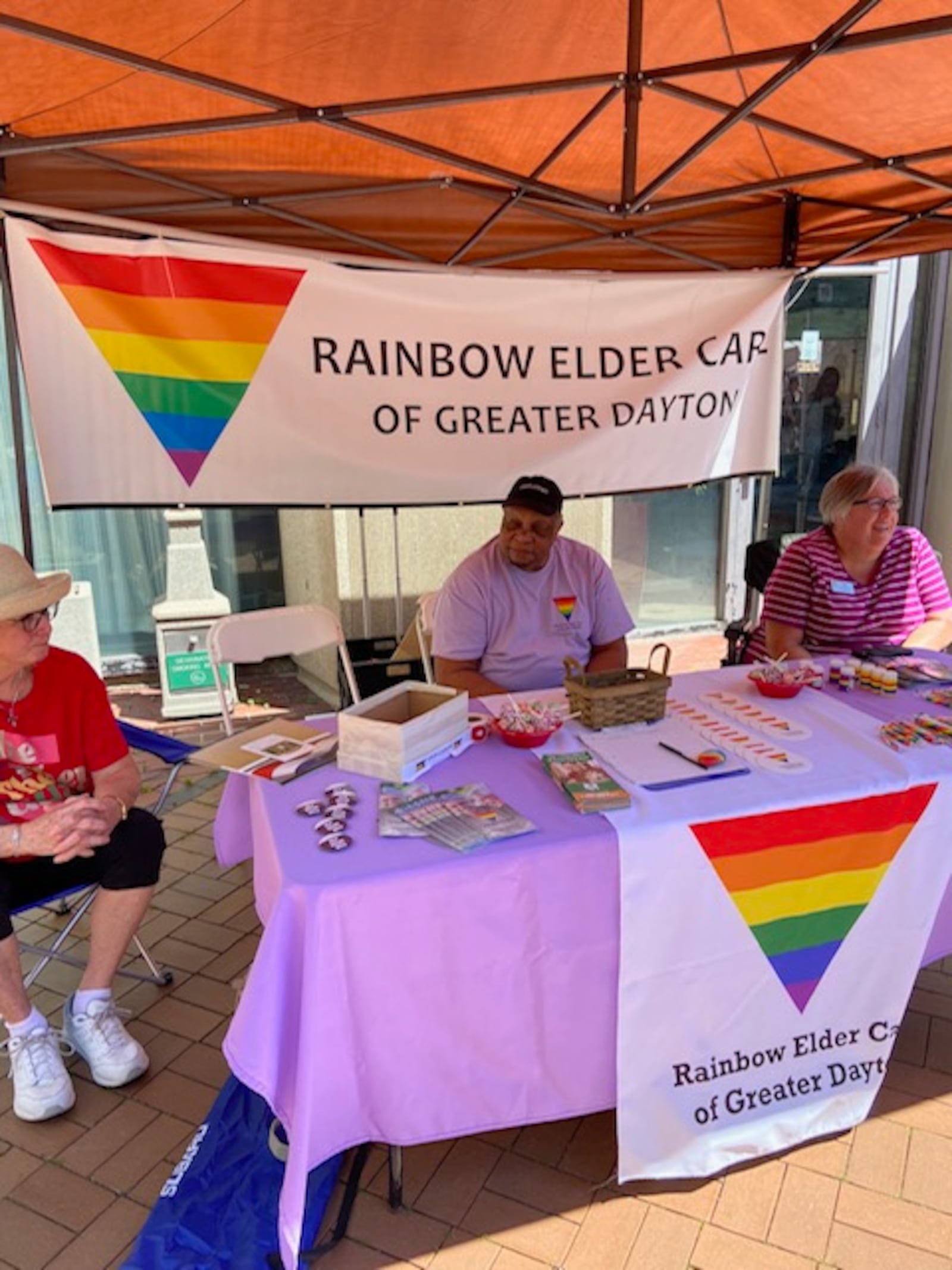 Members of the REC board staff our booth at a recent Dayton Pride. CONTRIBUTED