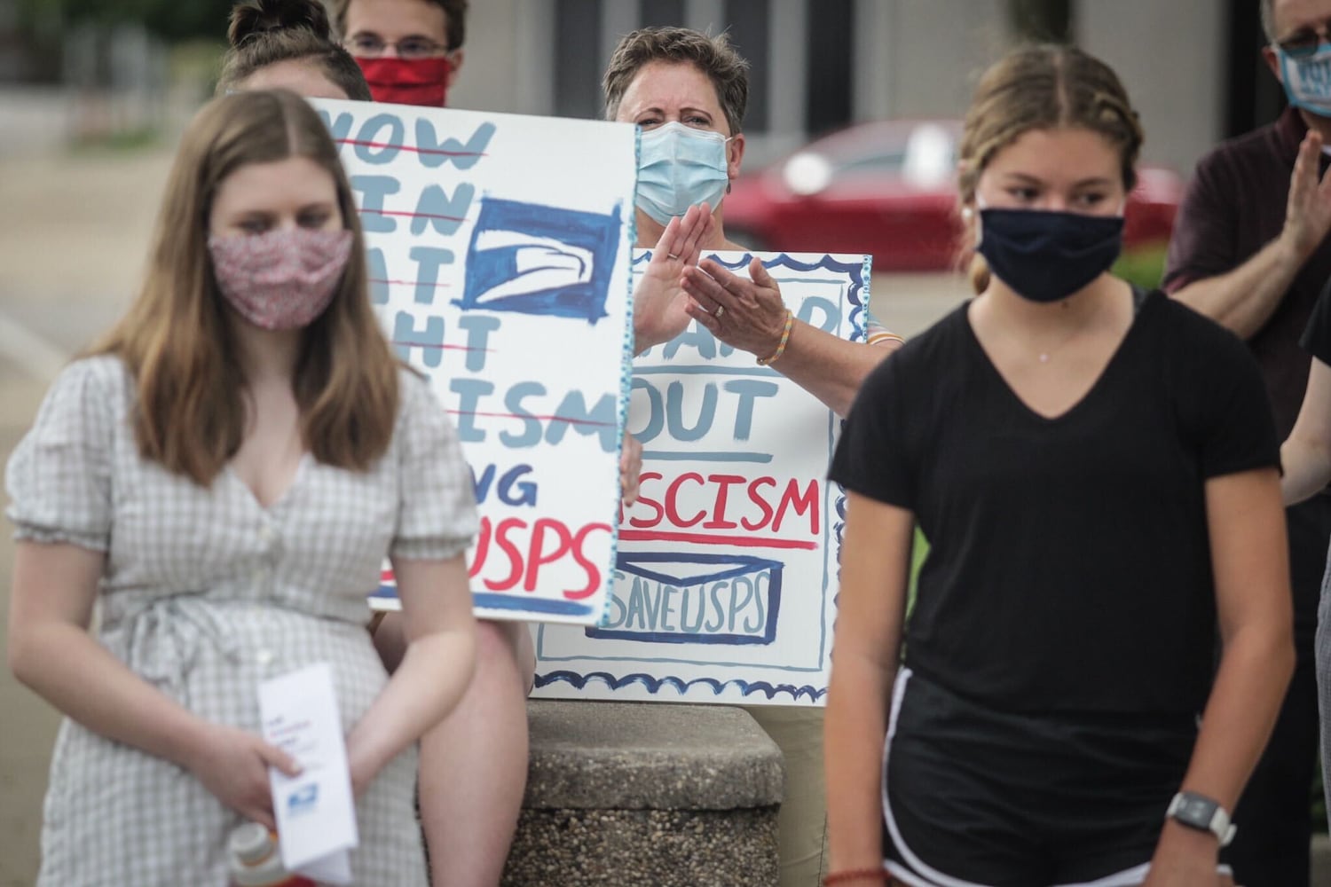 Demonstrators marched for post office