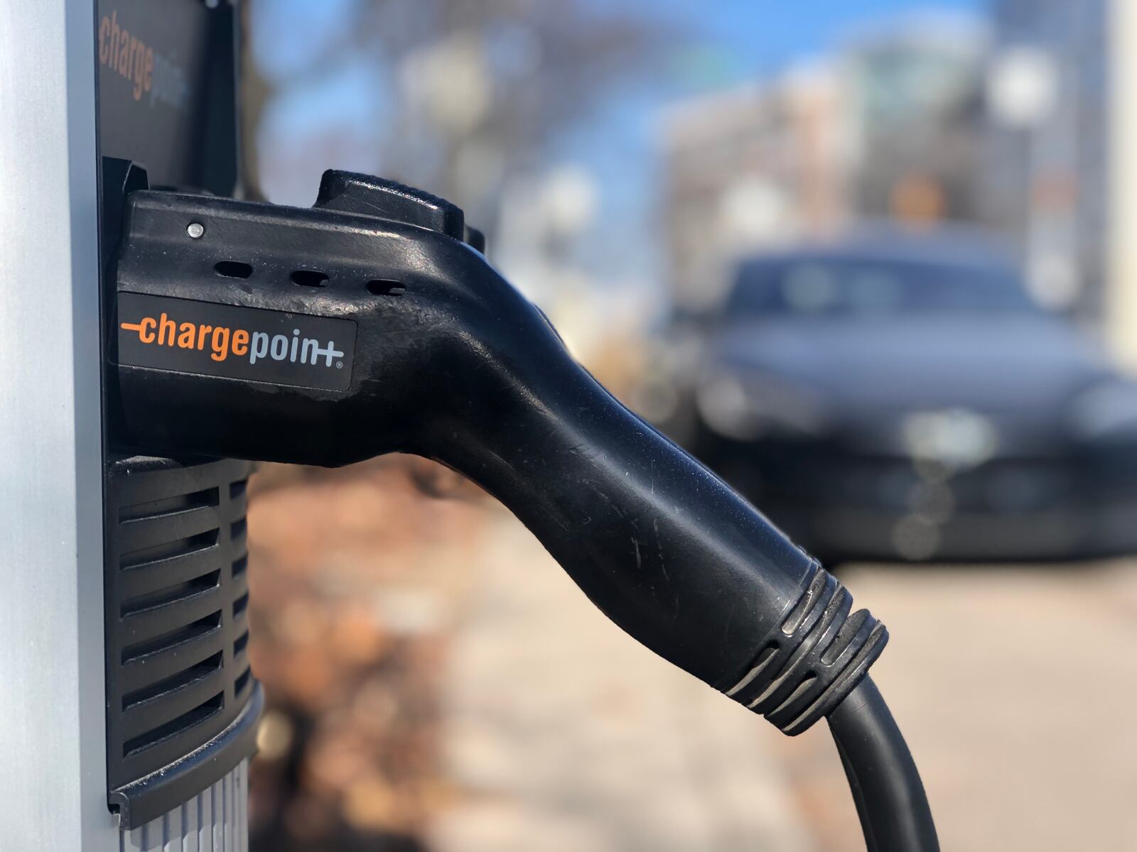 An electric vehicle charging station on North Patterson Boulevard in downtown Dayton. CORNELIUS FROLIK / STAFF