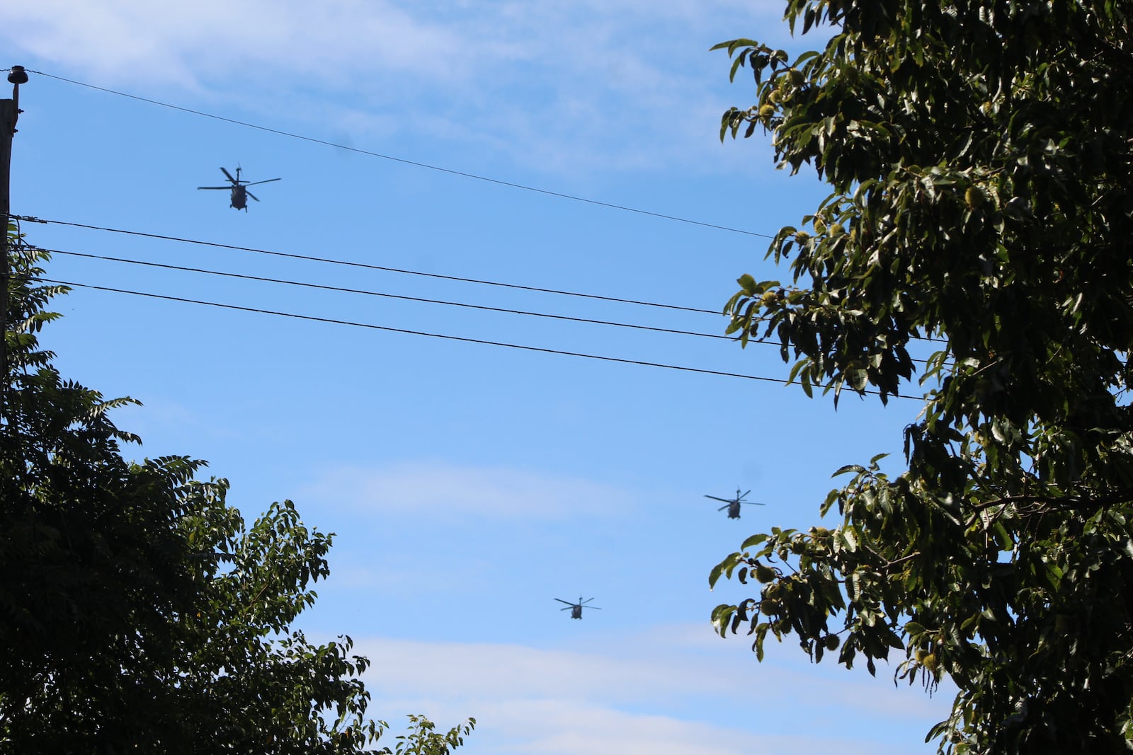 Military helicopters were seen Friday afternoon flying over the South Park neighborhood in Dayton. CORNELIUS FROLIK / STAFF