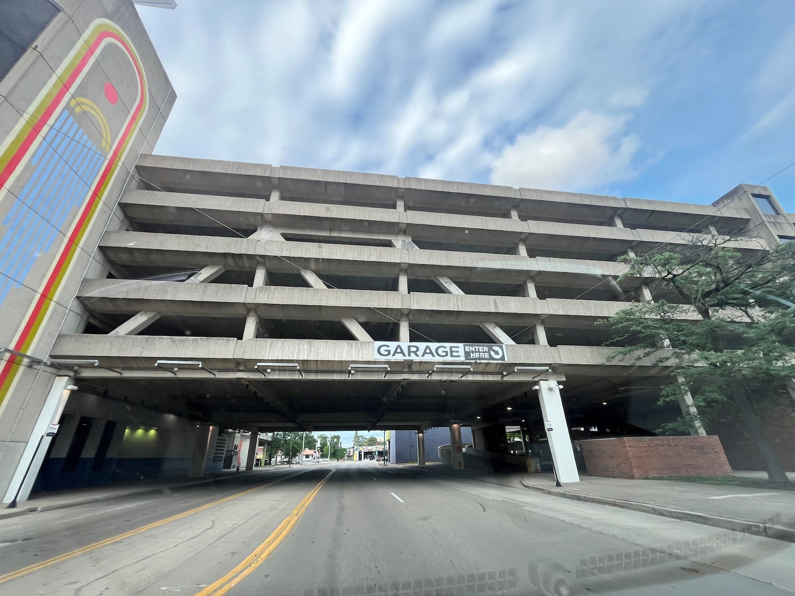 The city of Dayton is going to spend about $2.5 million to repair and improve the massive Oregon District parking garage, which has an entrance on East Fifth Street. Officials say the garage is important to efforts to create a new adjacent headquarters hotel. CORNELIUS FROLIK / STAFF