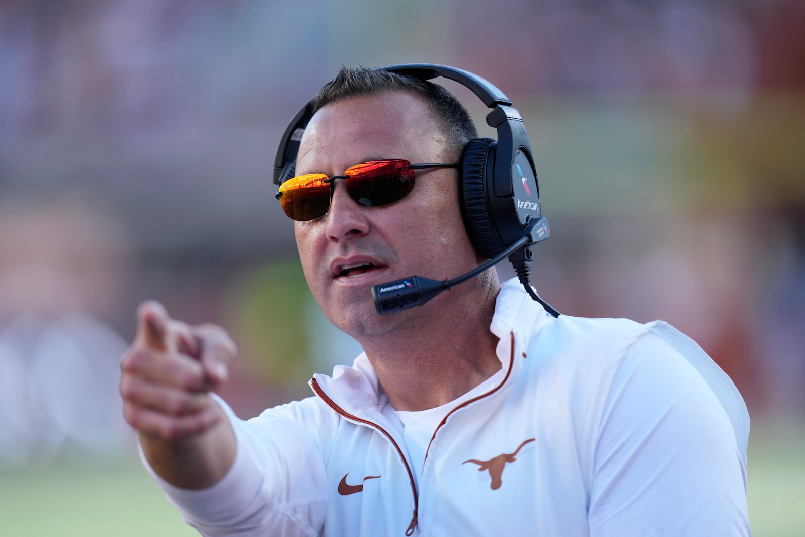 Texas head coach Steve Sarkisian signals during the first half of an NCAA college football game against Kentucky in Austin, Texas, Saturday, Nov. 23, 2024. (AP Photo/Eric Gay)