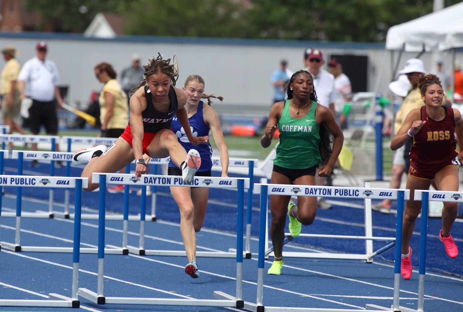 Wayne's Ric'Keya White races to victory in the 100-meter hurdles at the the Division I state track and field meet on Saturday, June 1, 2024, at Welcome Stadium in Dayton. David Jablonski/Staff