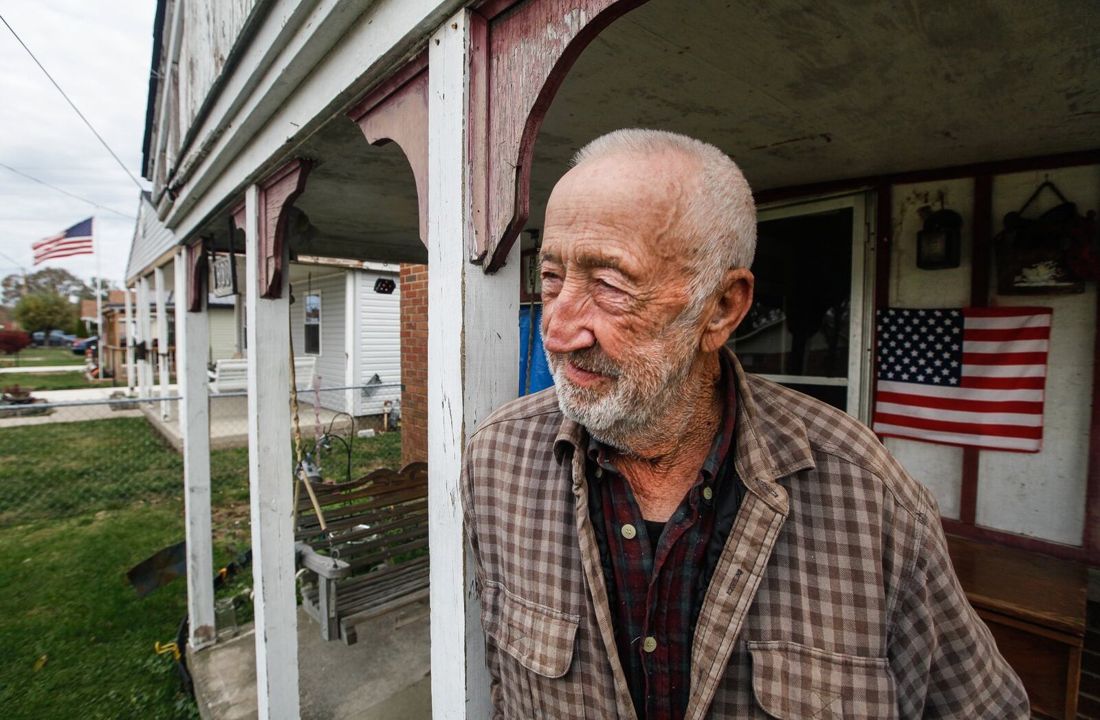 Elmo Blanken’s Ome Avenue home was uninsured against the EF4 tornado’s damage, which took out some windows that remain covered with only tarps as temperatures reach freezing. CHRIS STEWART / STAFF