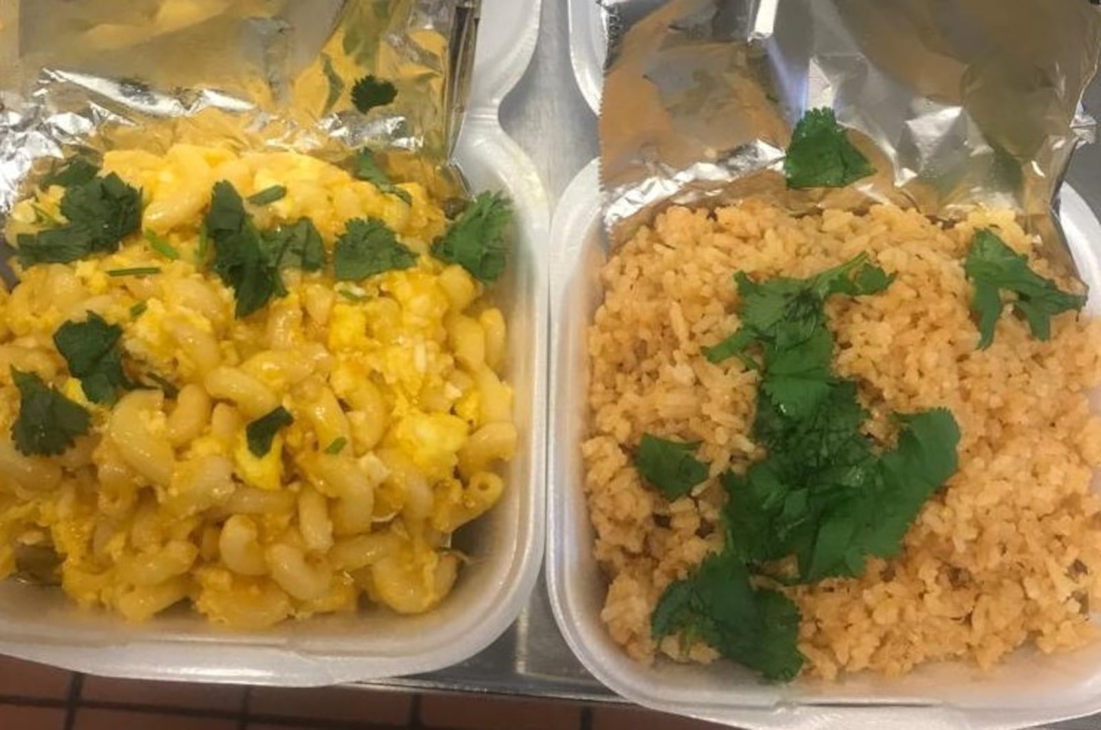 Theresa Barnes  and her family opened Eden Spice in early Jan. 2019. Mac and cheese and Jollof rice are pictured.