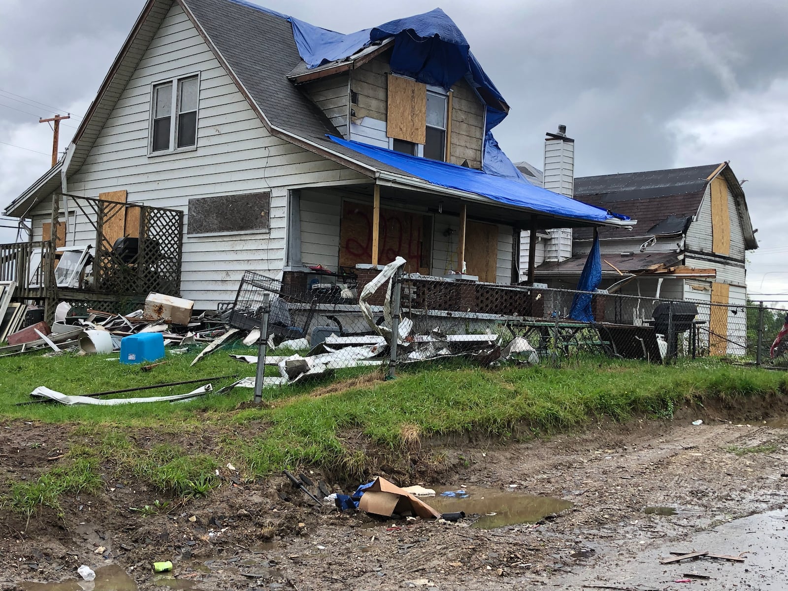 This house was one of many homes and businesses badly damaged in the Northridge section of Harrison Twp. by the Memorial Day tornado. STAFF PHOTO/Lynn Hulsey